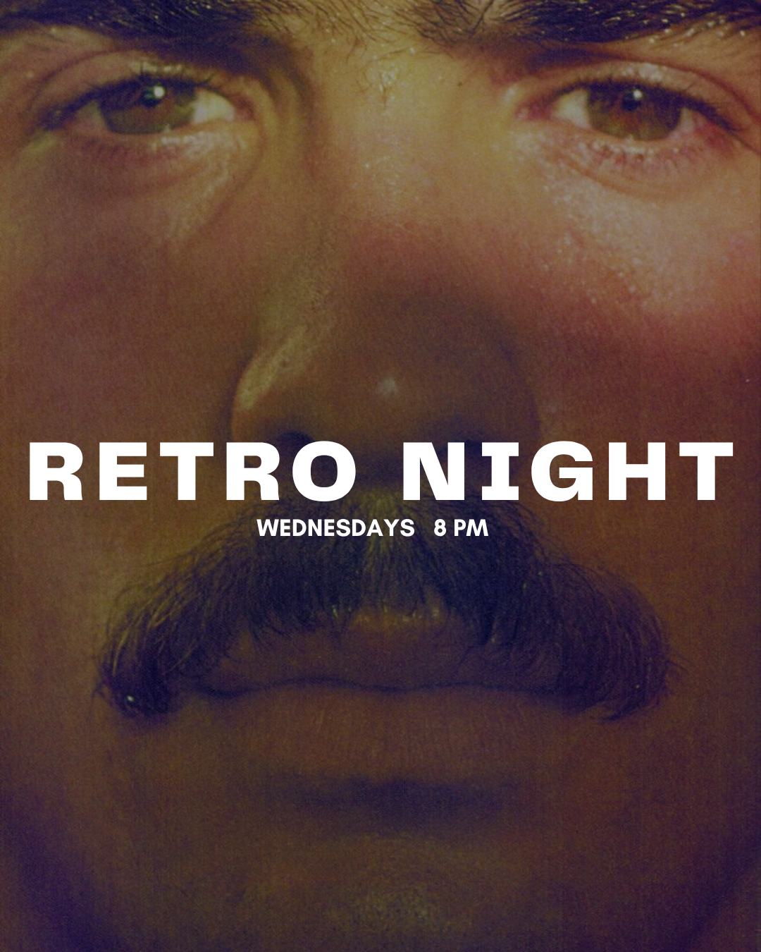 Close-up of a man's face with mustache and beard, promoting a retro night event every Wednesday at 8 PM.