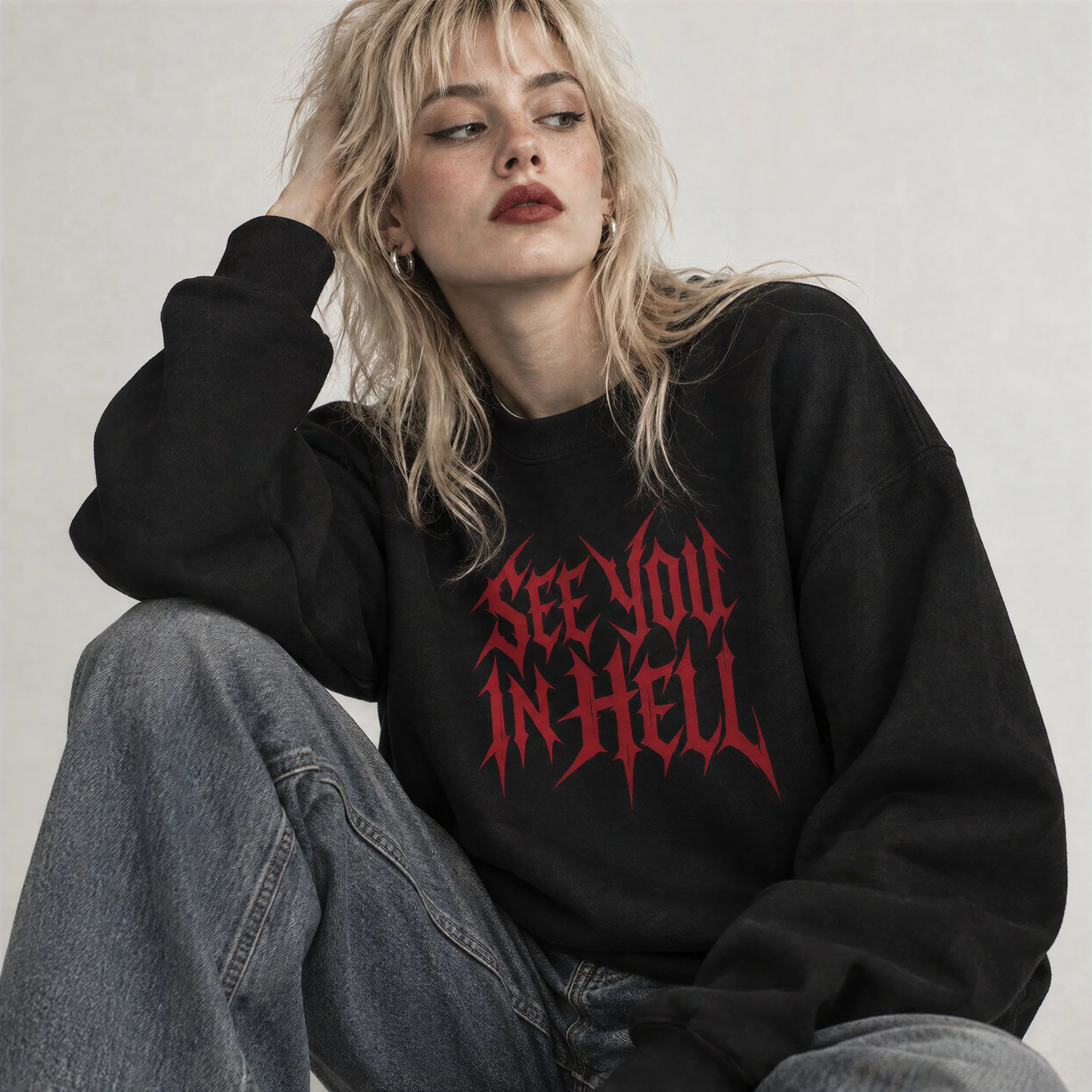 Model wearing NyxAbbey See You in Hell black gothic graphic sweatshirt
