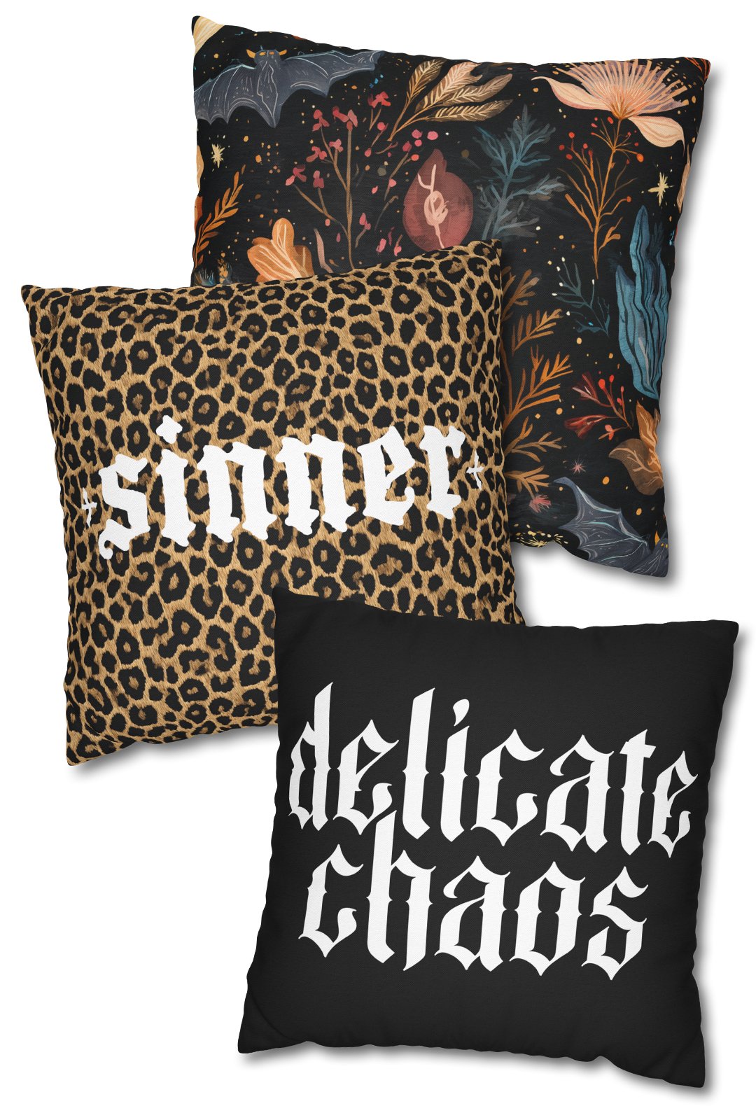 Three decorative throw pillows featuring Halloween and gothic themes with floral, leopard, and black text designs.