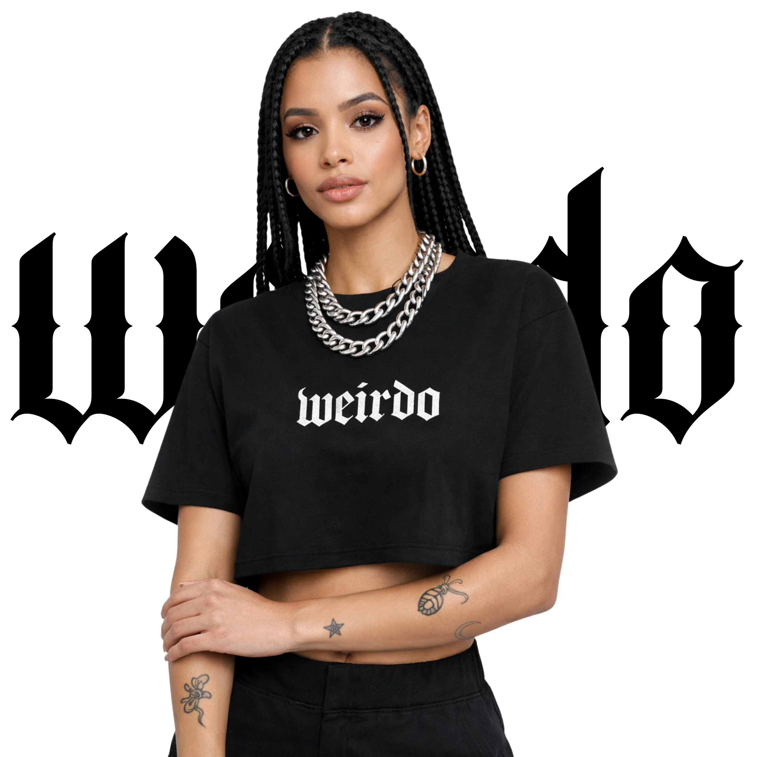 Young woman with braided hair wearing a black crop top with 'weirdo' written on it, layered silver necklaces, and tattoos on her arms, standing in front of a white background with black Gothic-style text.