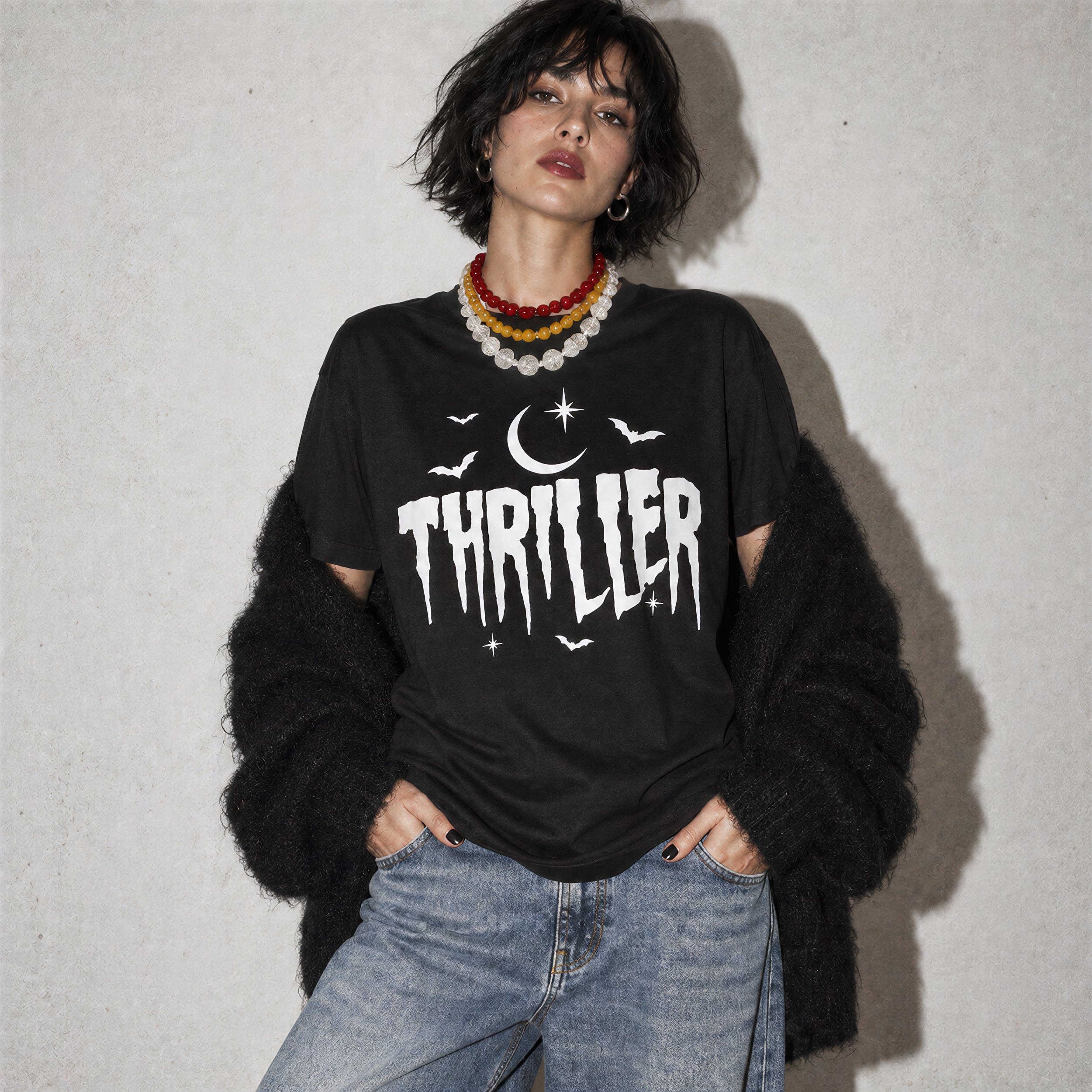 Model wearing NyxAbbey Thriller black horror graphic T-shirt