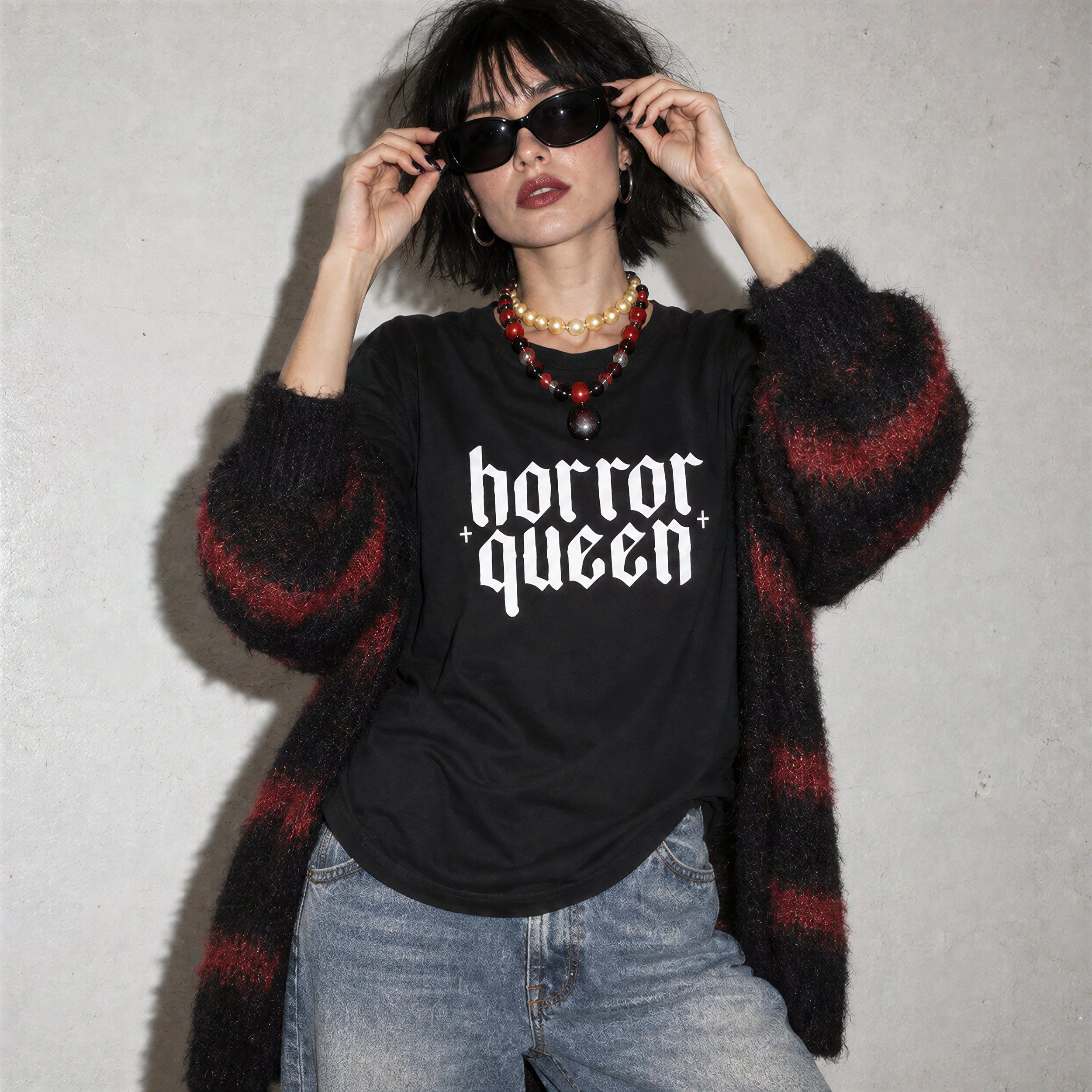 Model wearing NyxAbbey Horror Queen black horror graphic T-shirt