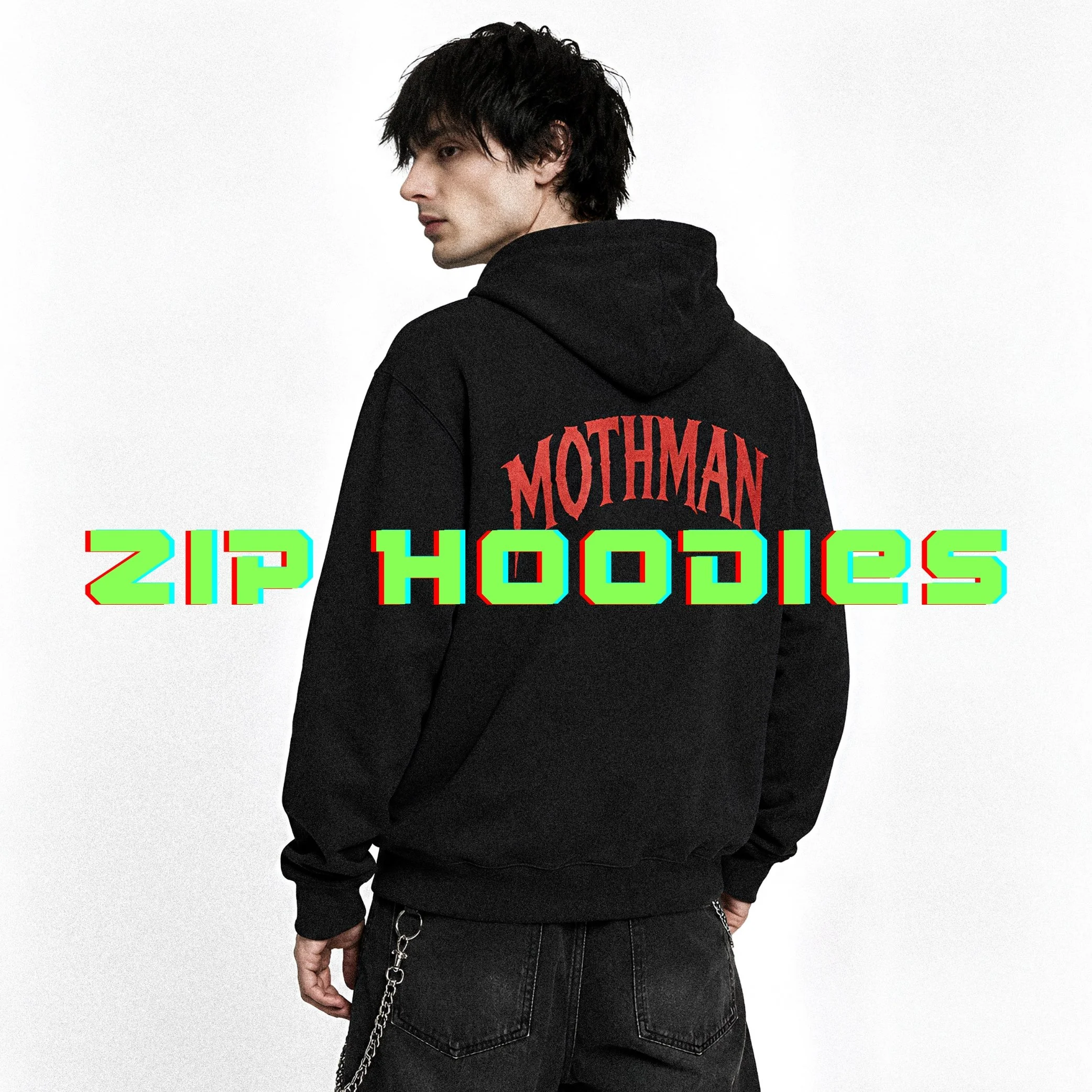 A young man with black, slightly messy hair watching over his shoulder, wearing a black hoodie with red text on the back and black pants with a chain attached.