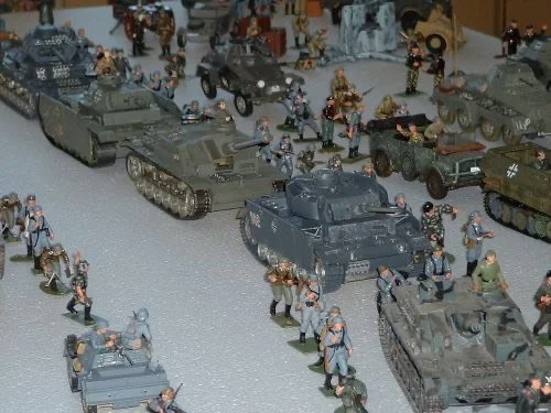 Panzers and halftracks crowd the approaches, stalled by ice, exhaustion, and the narrowing streets ahead.