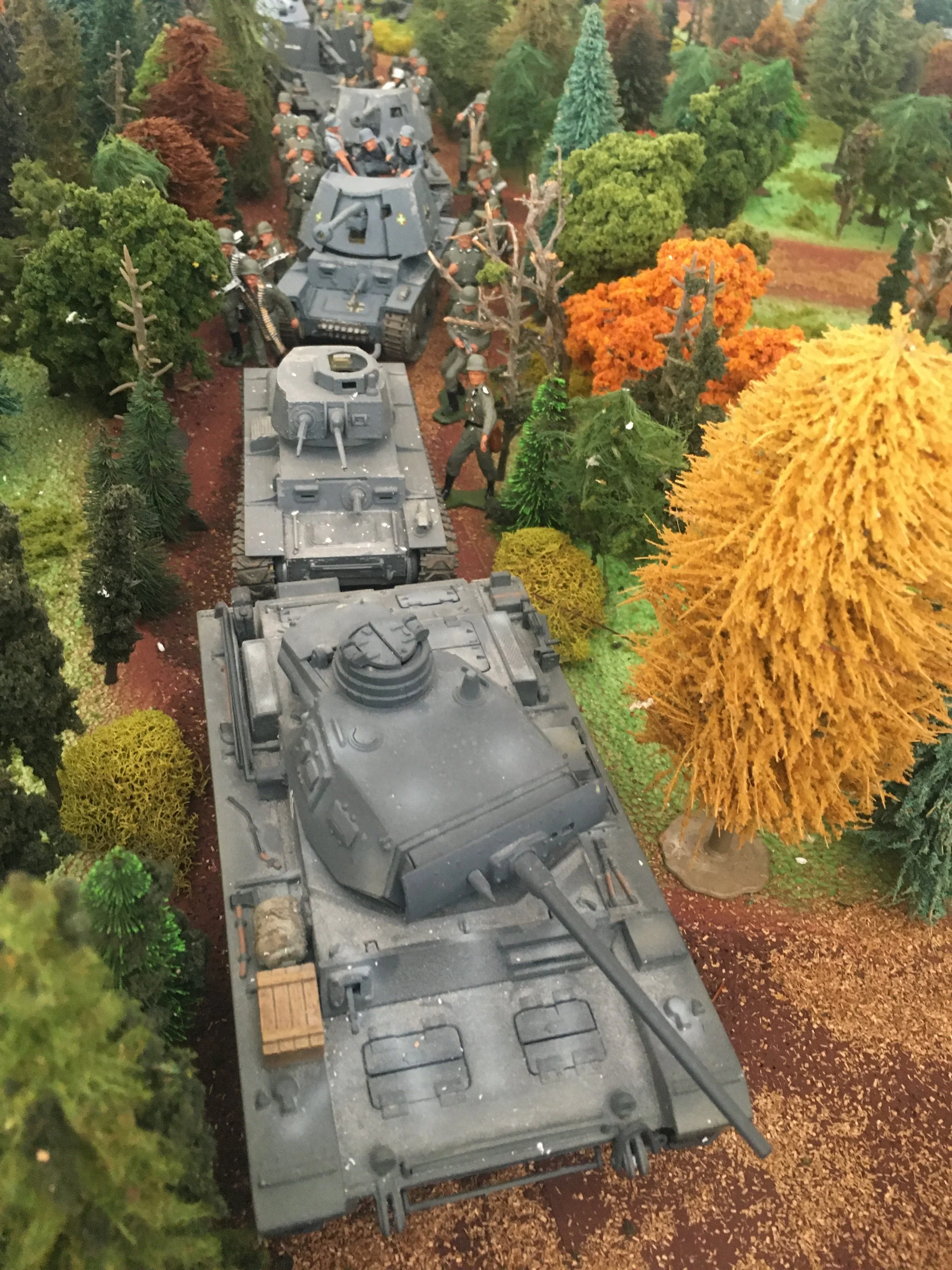 German armor pushes through the dense Ardennes forest—an armored column threading its way toward the Western Front’s breaking point.