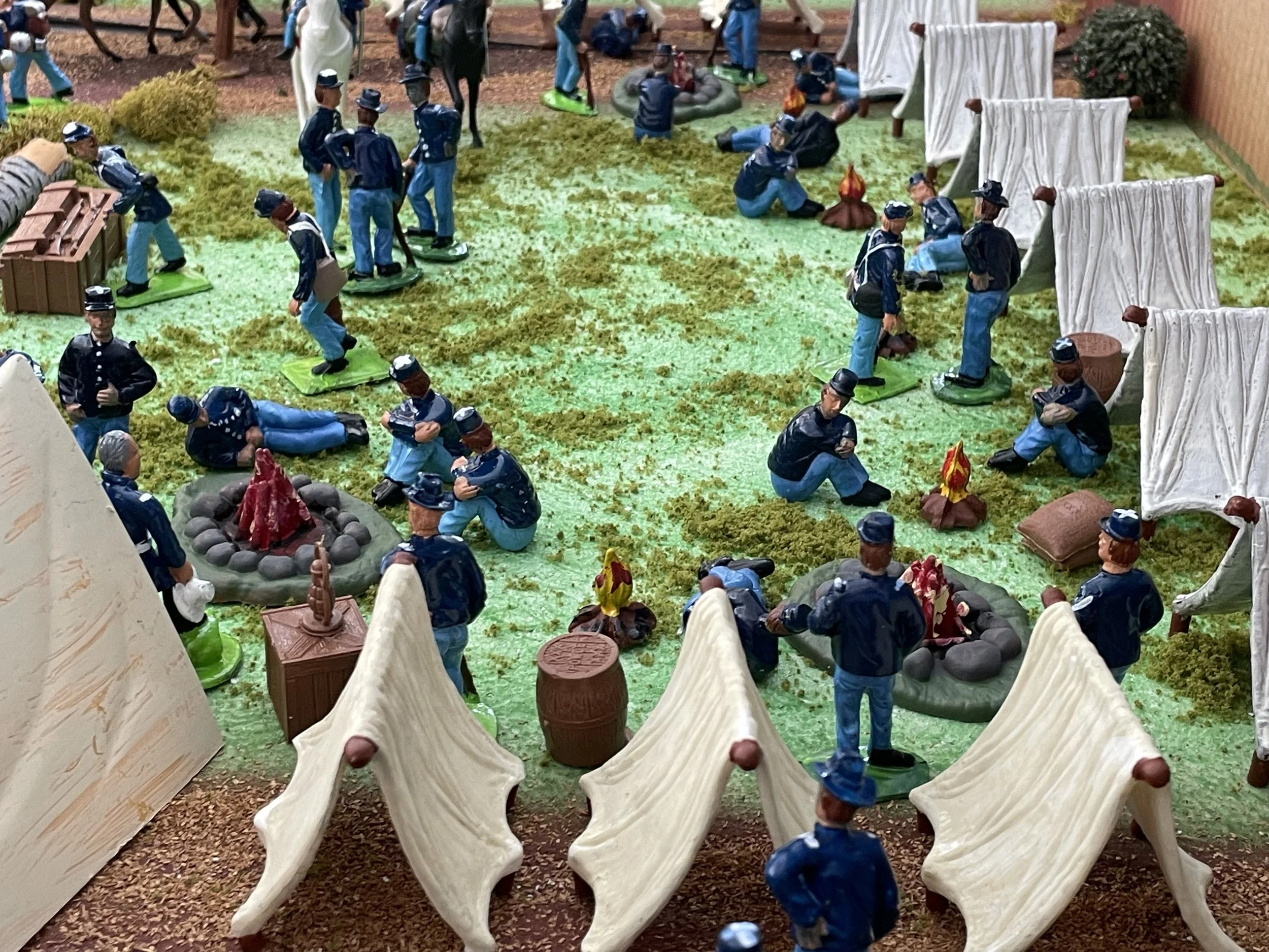 Between marches and battles, soldiers lived in ordered rows of canvas tents known as company streets. Days were filled with drill, cooking, cleaning equipment, and long stretches of waiting. Around shared fires and simple routines, camaraderie formed