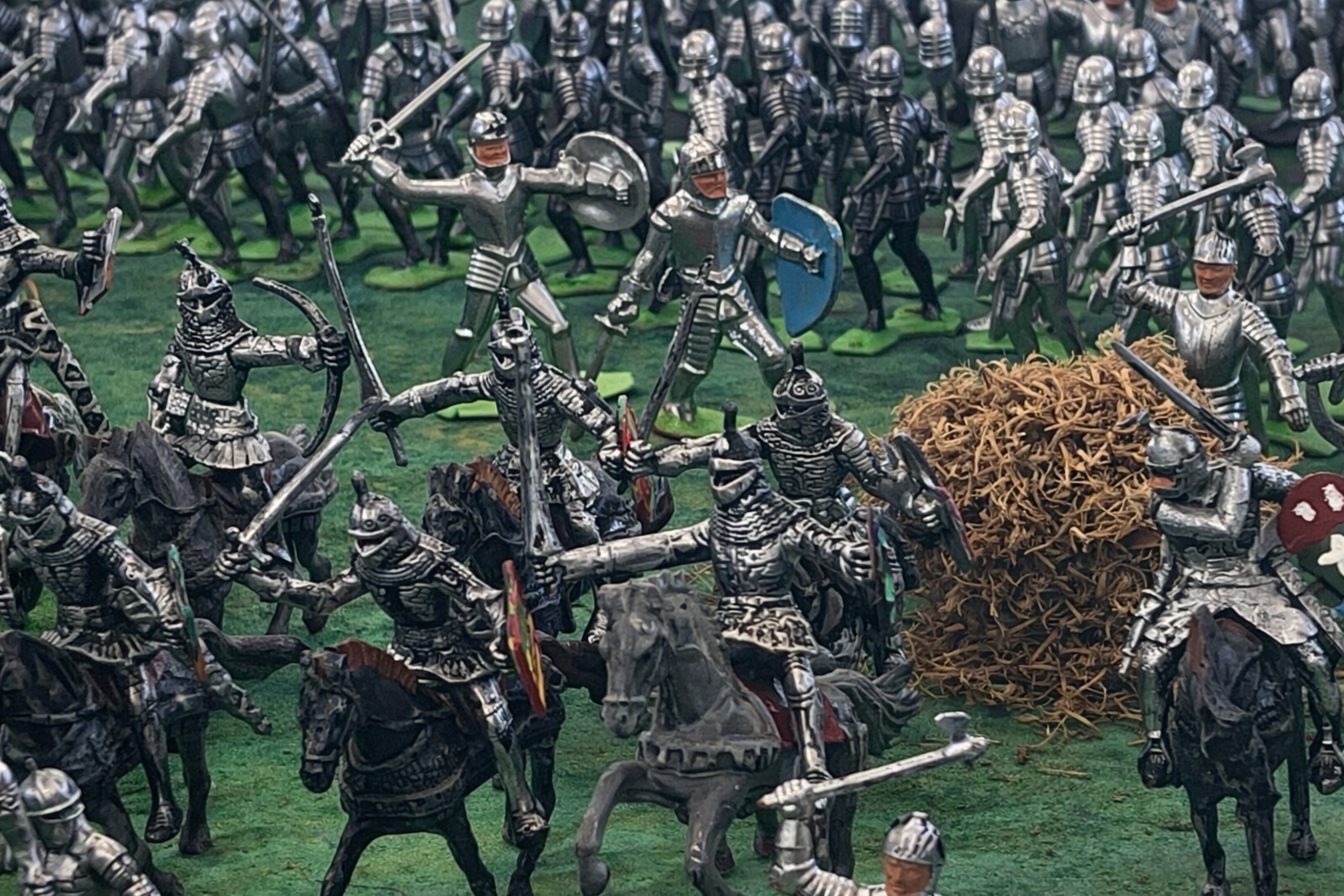 Chaos ensues as successive waves crash into the fray, packing men so tightly together that neither effective combat nor retreat is possible; those in the front are crushed forward, while those behind are pushed into a battle they cannot properly figh