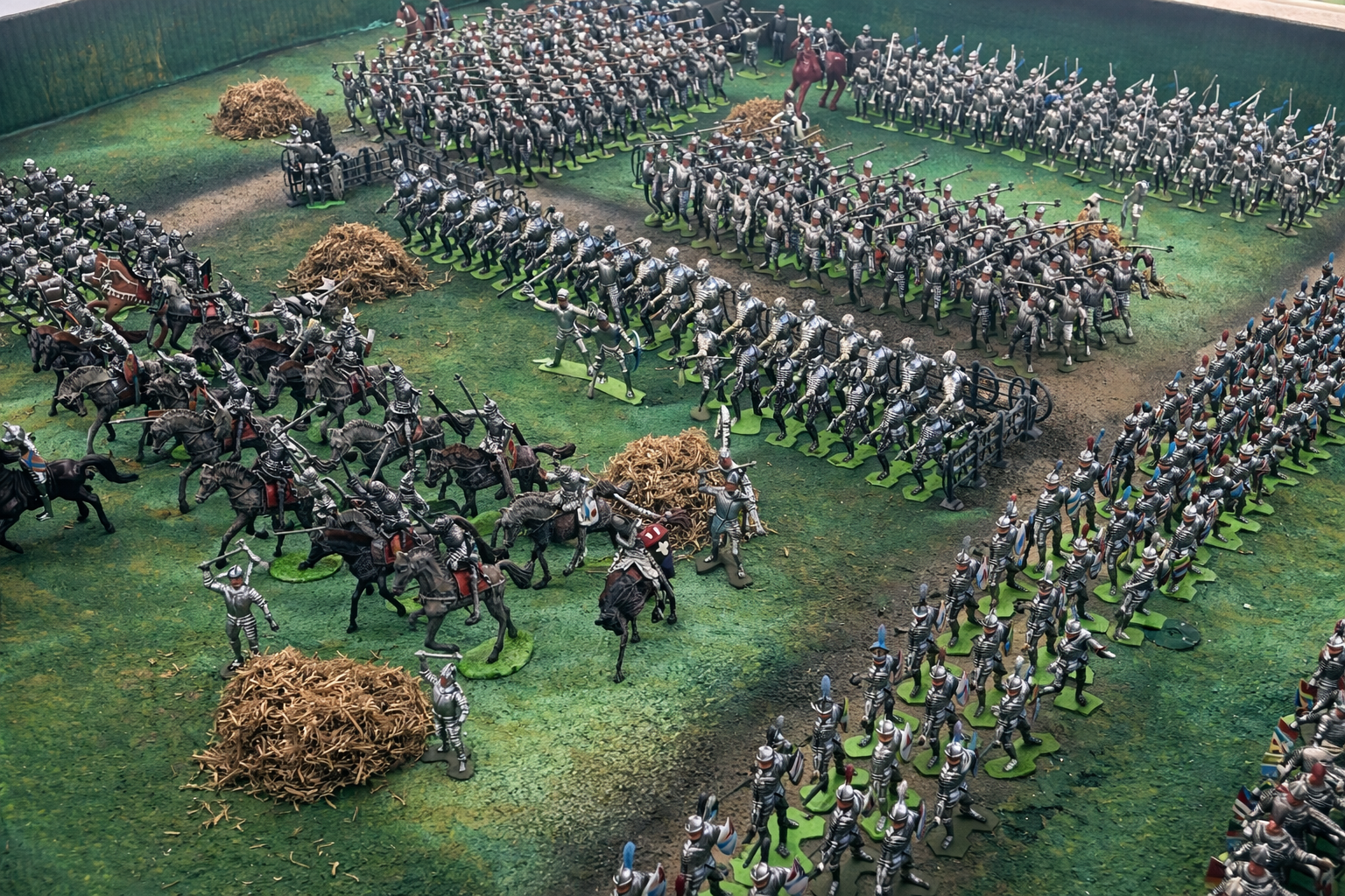 French cavalry and infantry formations mass on the field near Agincourt, moments before advancing toward the English line.