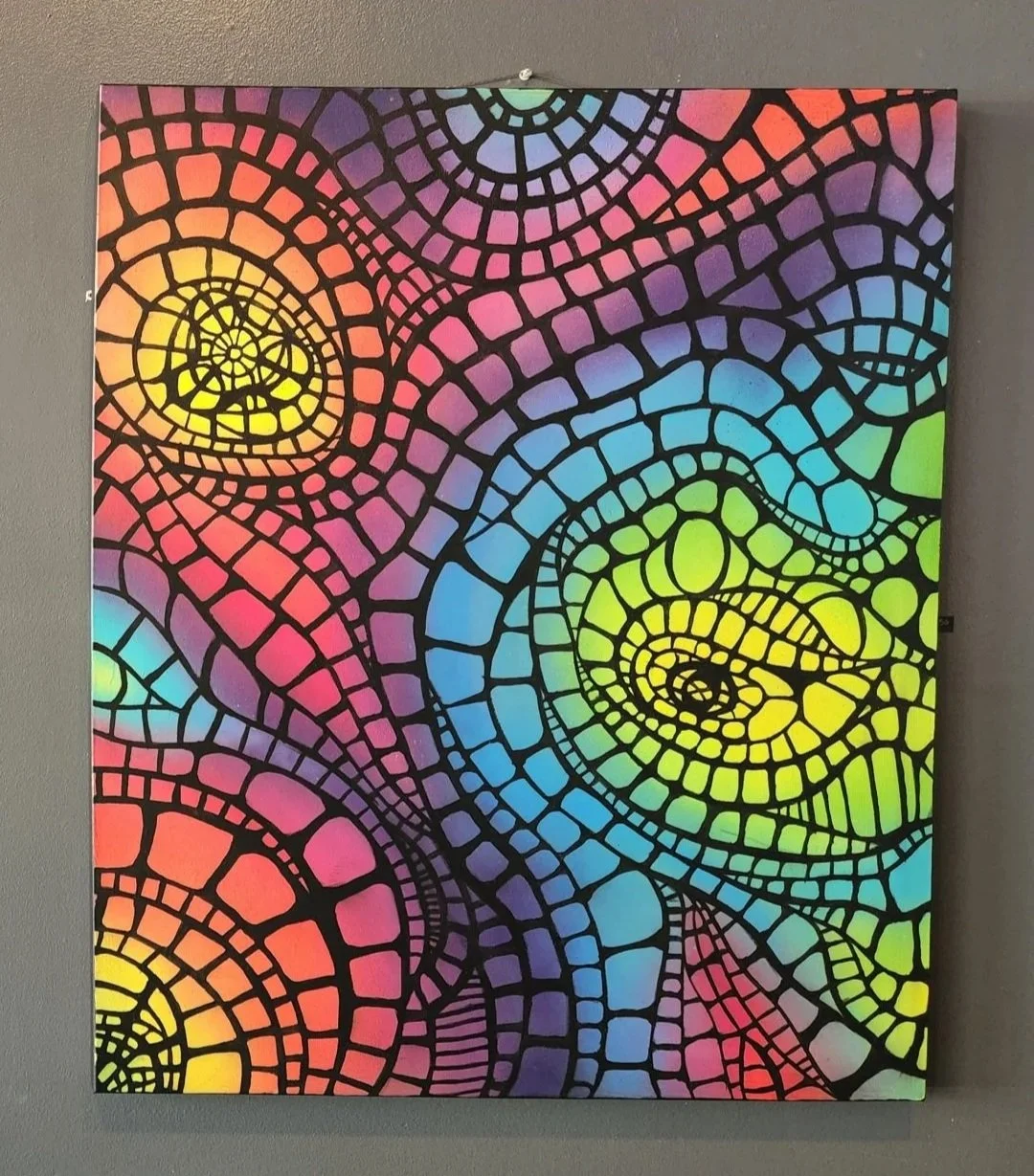 Abstract rainbow pattern painting.