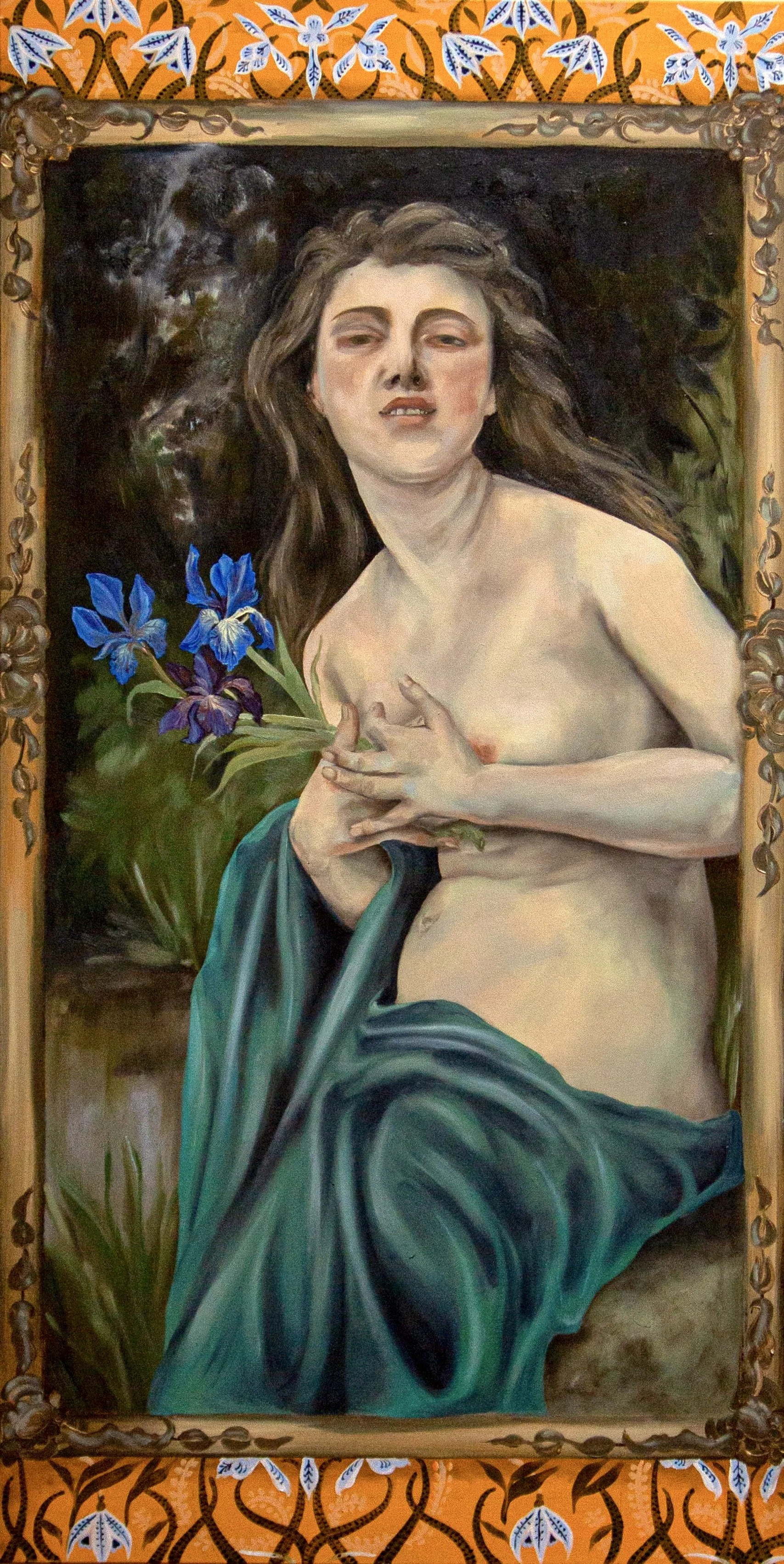 A painting of a topless woman with long brown hair, holding blue and purple irises, partially draped in a green cloth, surrounded by a floral border.