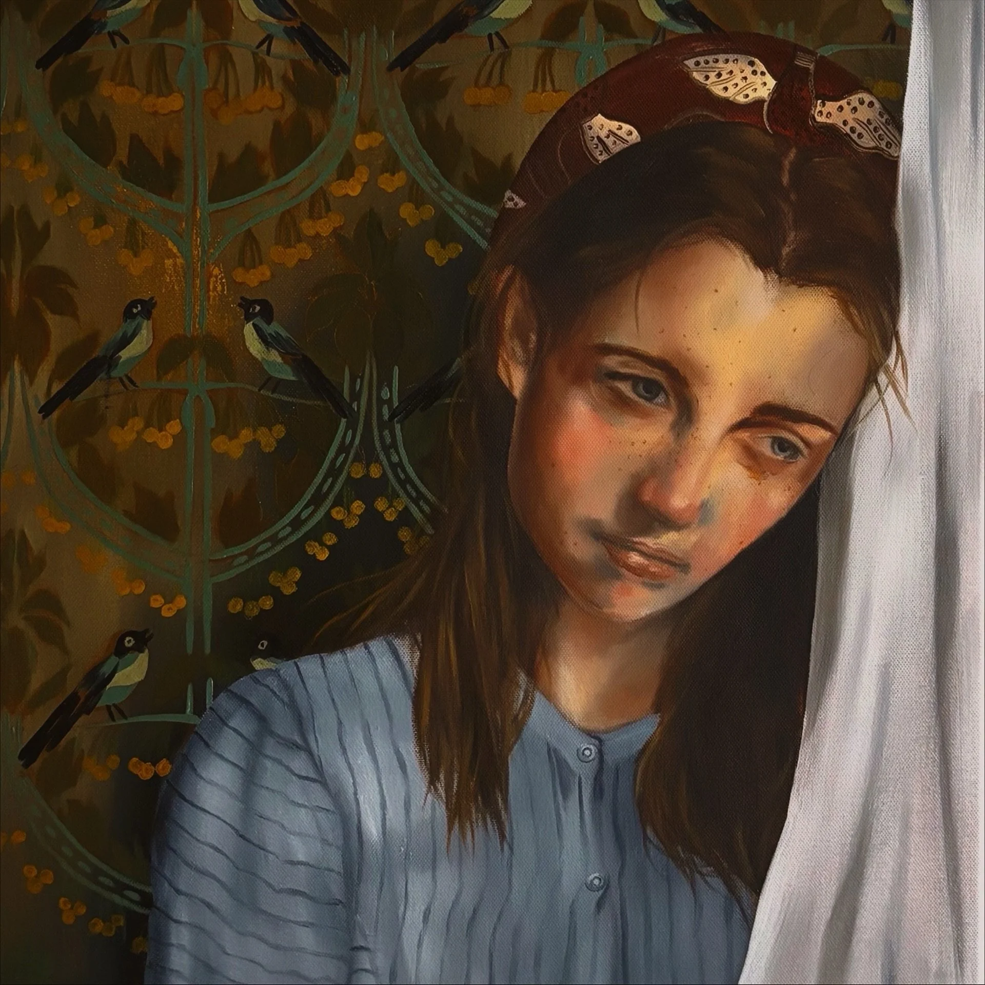 A realistic painting of a young woman with brown hair and blue eyes, looking thoughtfully out from behind a white curtain. The background features a decorative golden design with small birds perched on it.