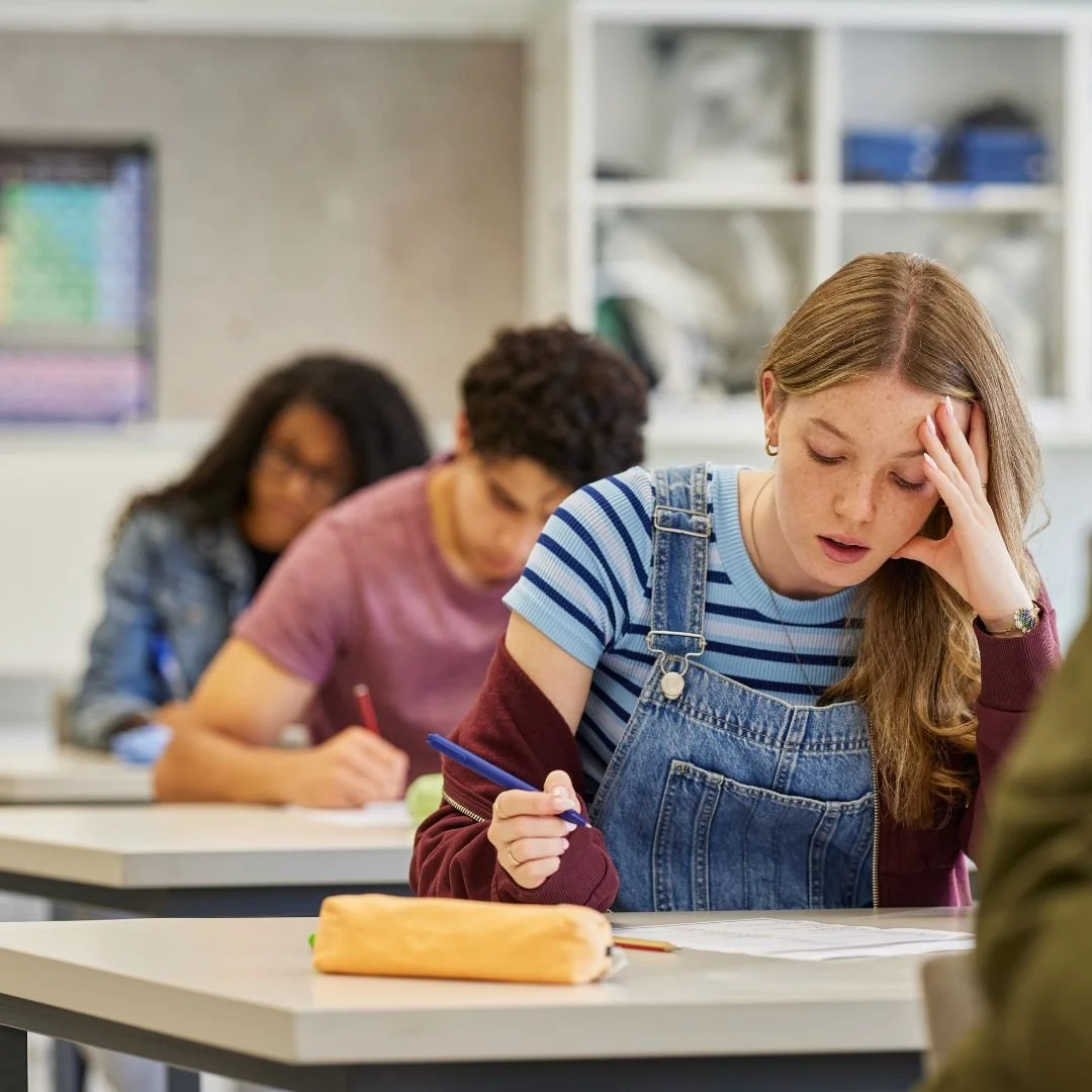 high school students taking a test