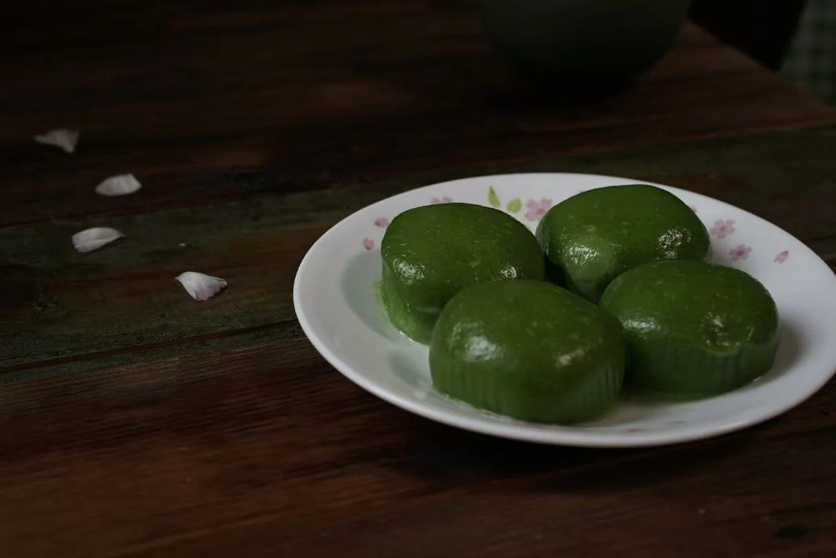 Qing Tuan (green glutenous rice ball) - a seasonal delicacy made with juice from fresh mugwort leaves. By Yan Xu. Submitted 4th April, Guangzhou.