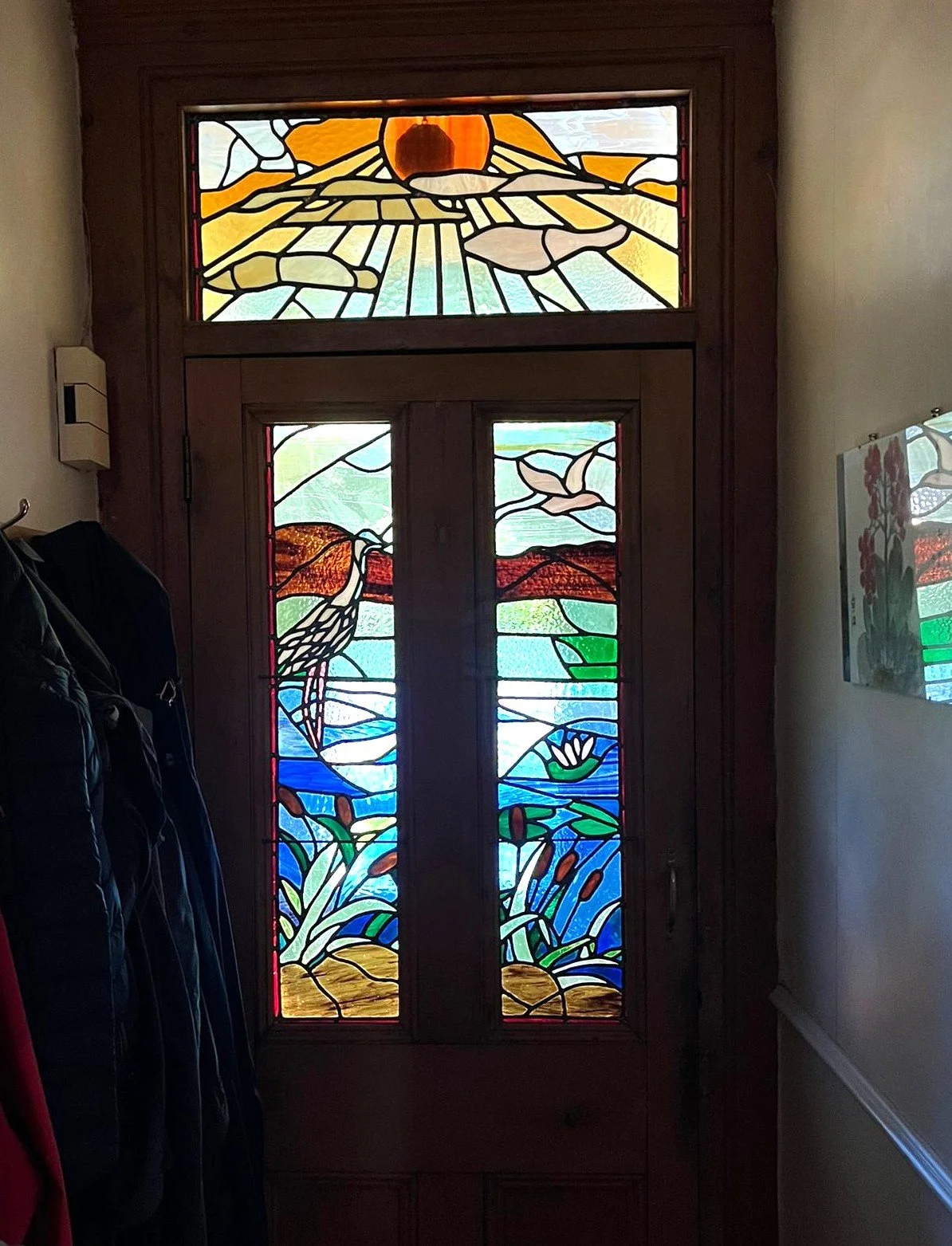 Solstice sunrise through stainglass window. By Frank, from Preston.