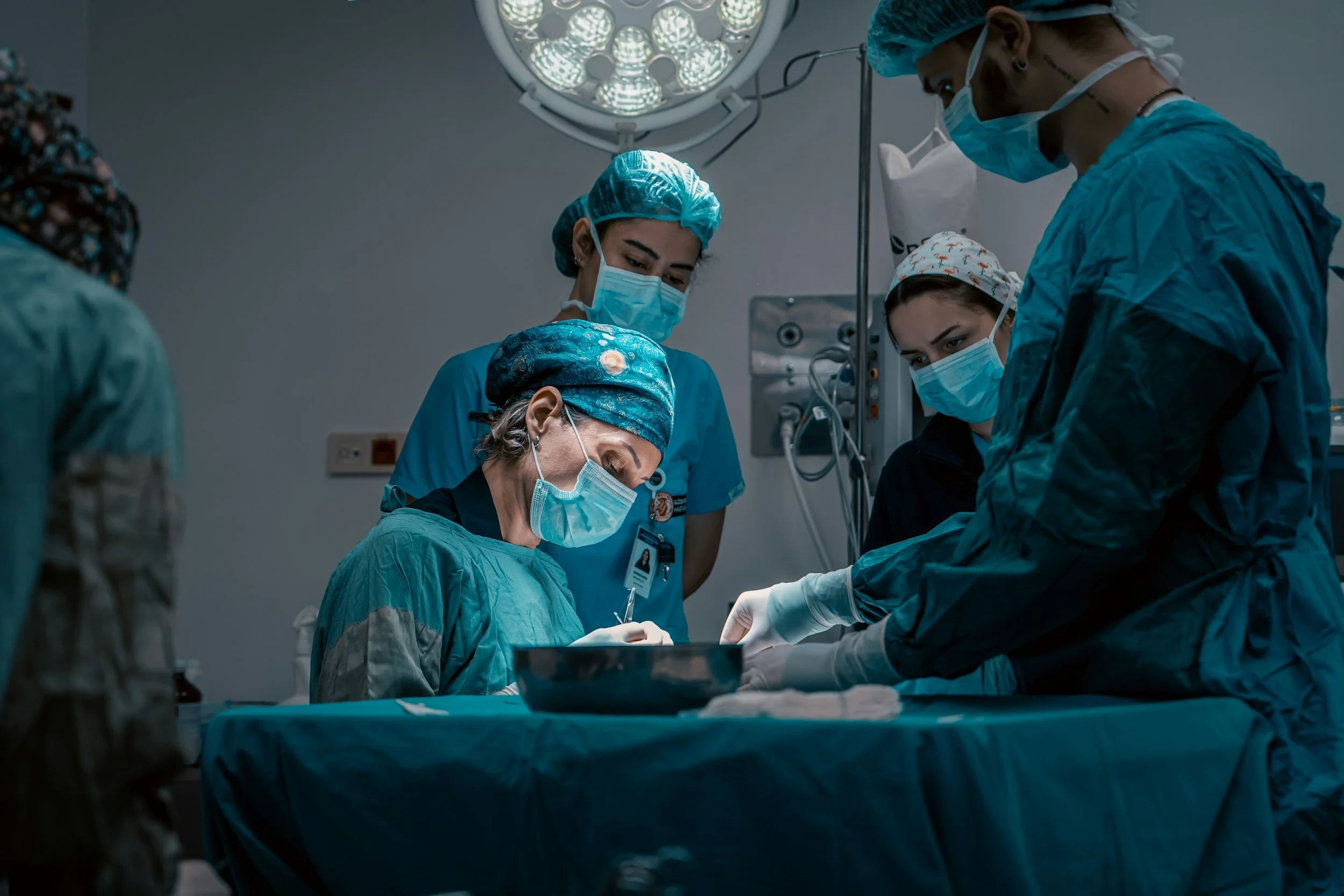 Surgeons performing a surgery