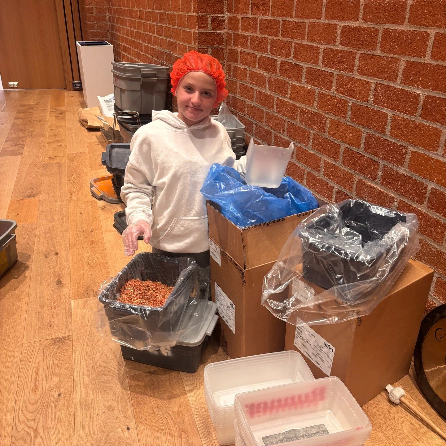 Recently I volunteered with Rise Against Hunger to help fight food insecurity! We packaged meals for people in need to make at home! In total, we made 10,000 meals, and each meal can feed six people! A local organization hosted the event, and you can