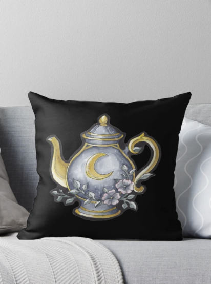 Decorative pillow featuring a silver teapot with a crescent moon and floral design on a black background.