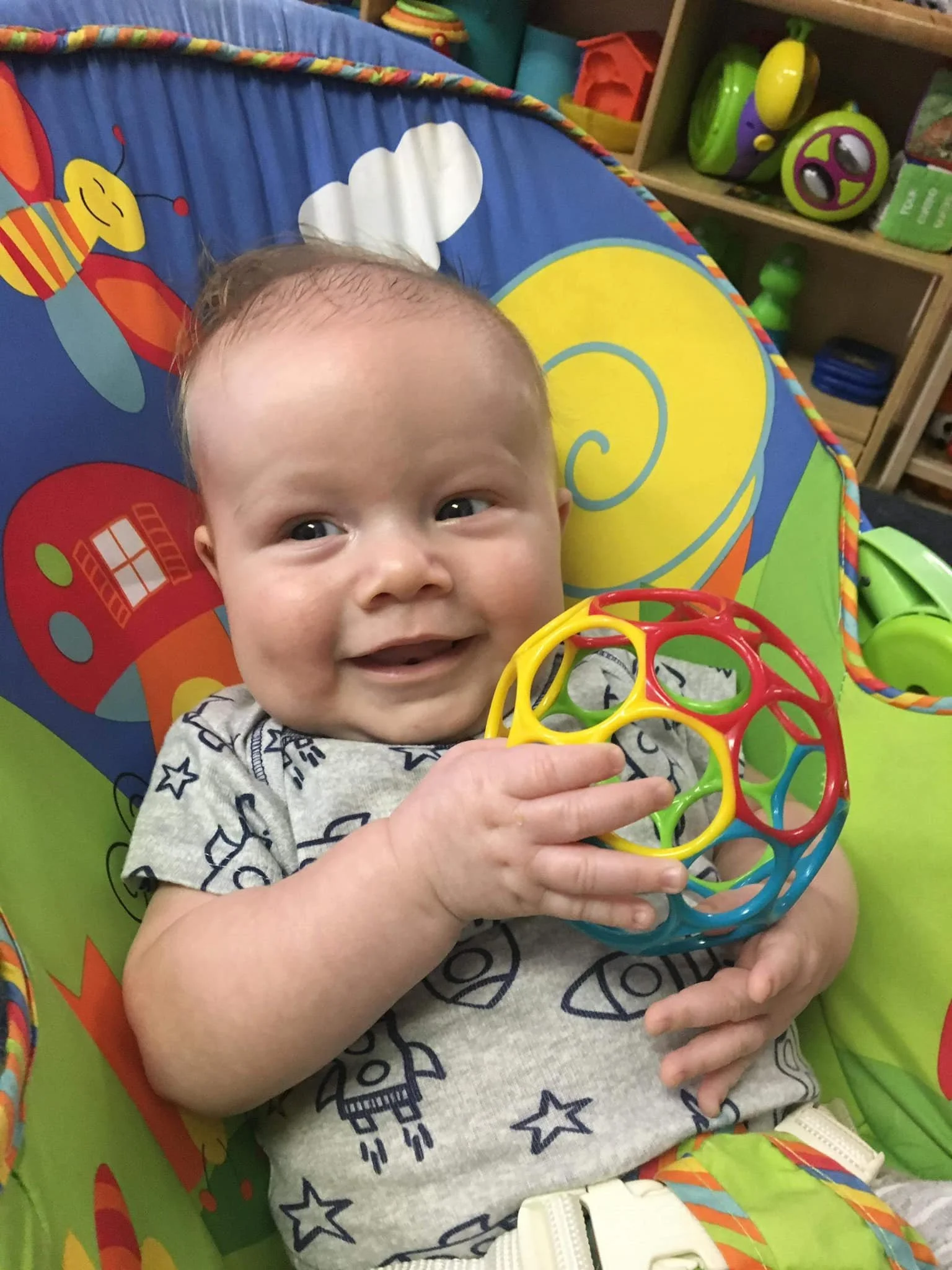 Infants having tummy time on a mat