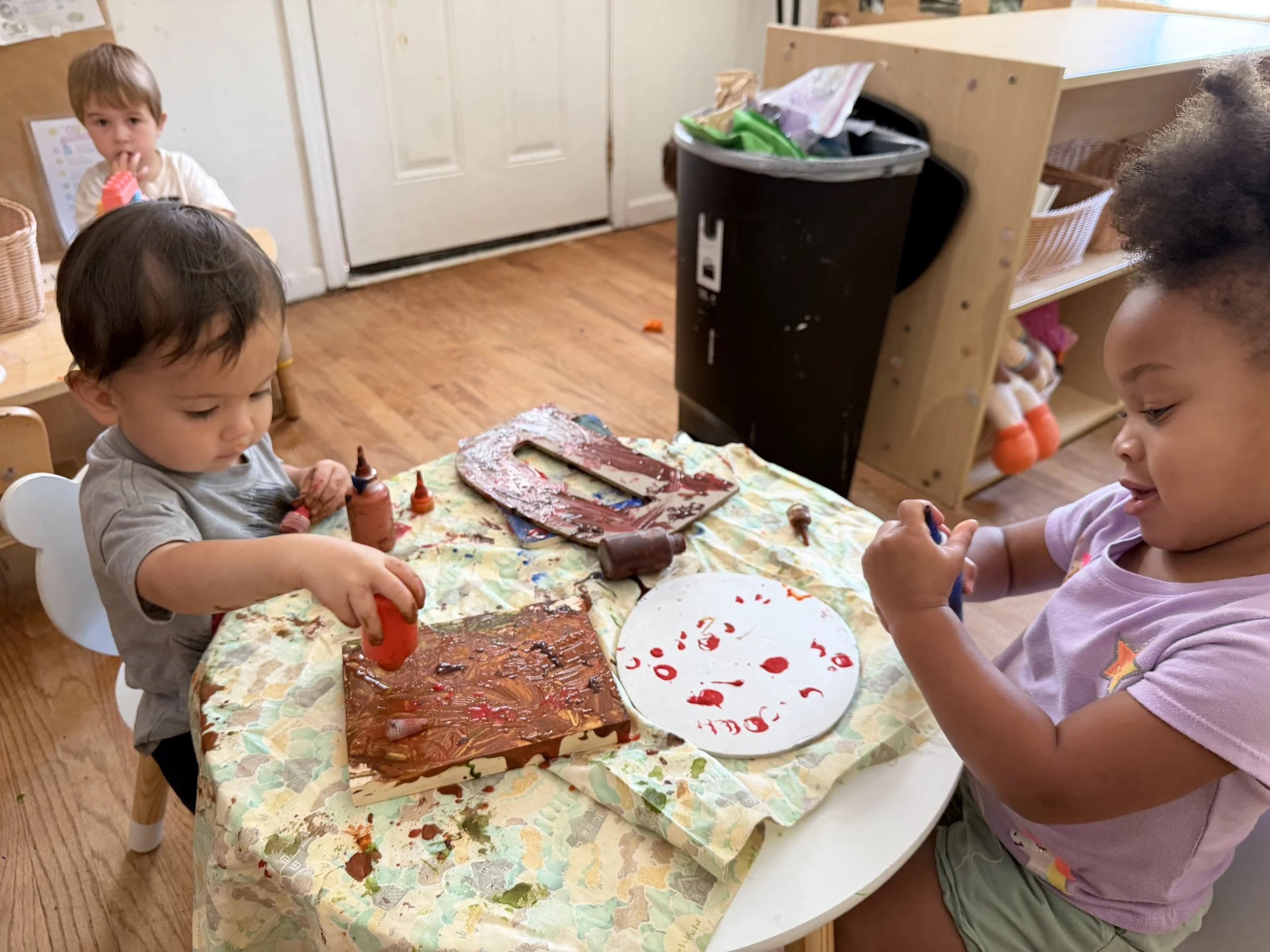 Two children working on an art project
