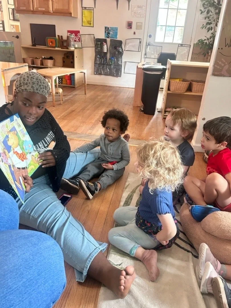 2 and 3 year olds listening during story time