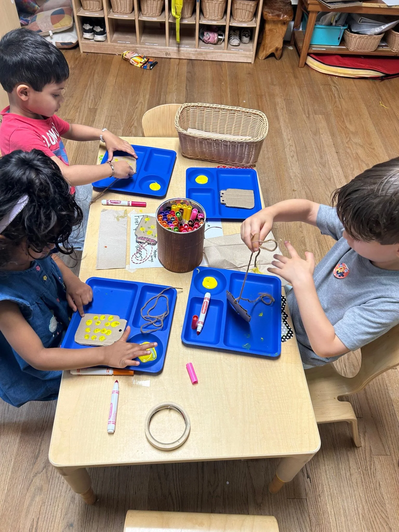 2 and 3 year olds participating in a sensory activity