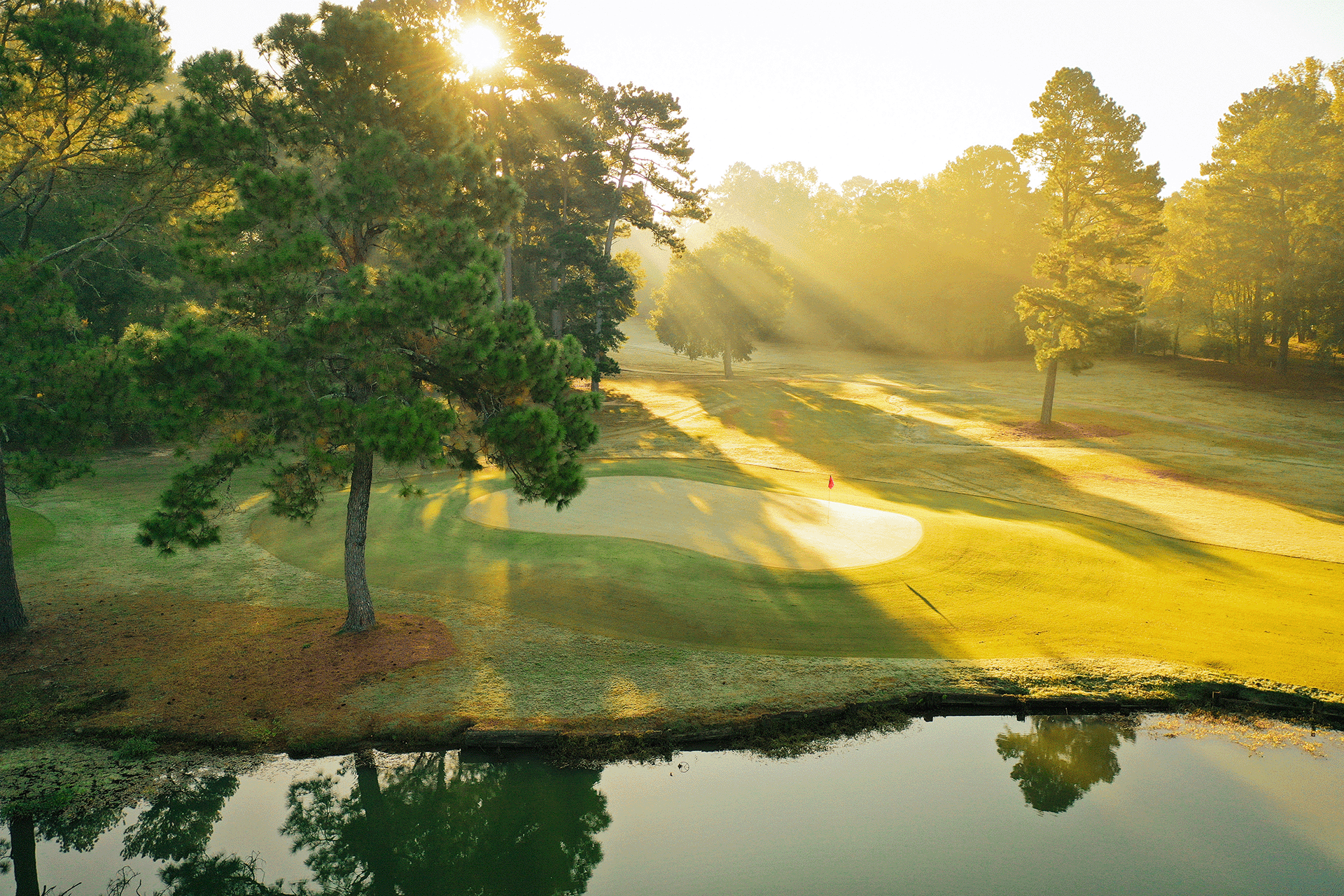 Sunrise view of the golf course at Live Oaks Golf Club