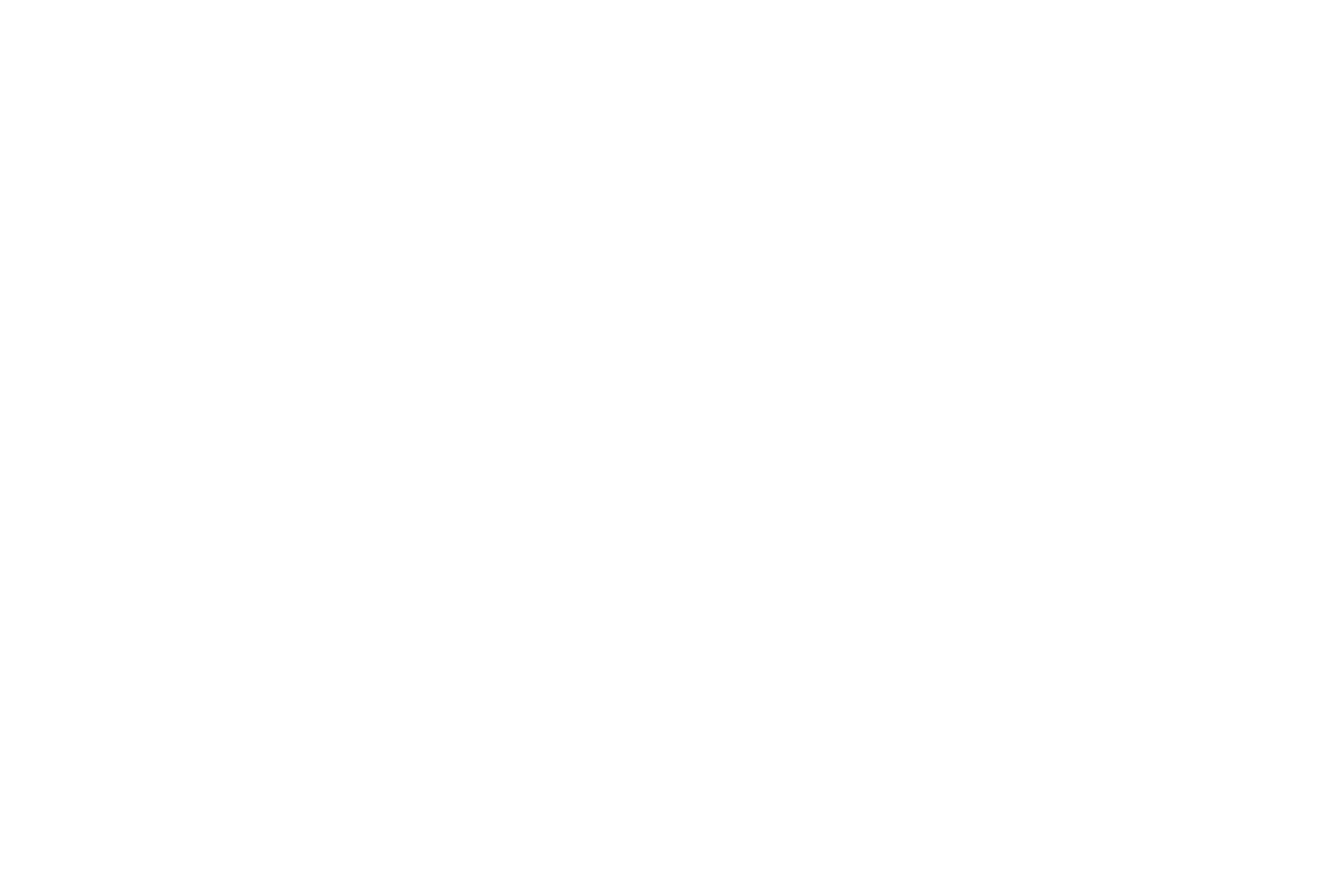 An icon of four people grouped together in white on a black background.