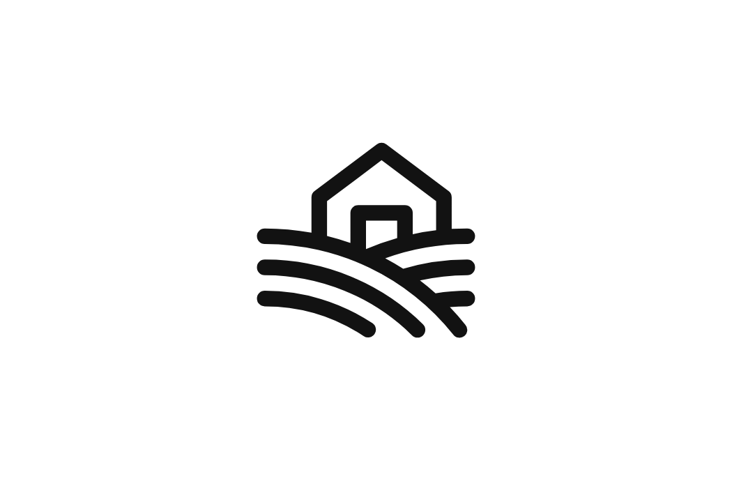 A simple black and white outline of a house with a door, situated in a landscape with curved lines representing land or fields.