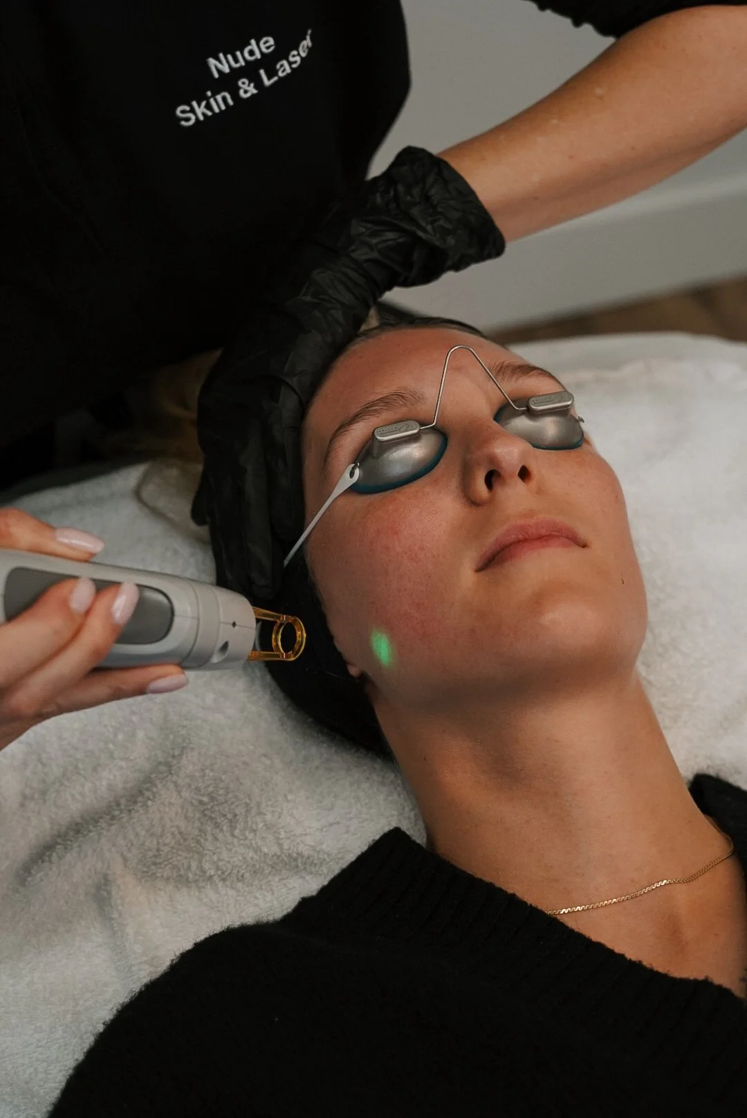 Client receiving laser skin rejuvenation treatment at Nude Skin & Laser in Langley, BC.
