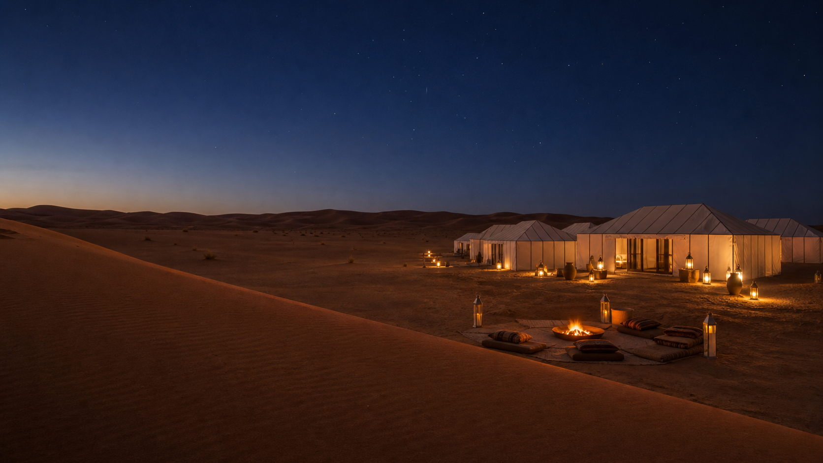 Luxury camp illuminated beneath the stars at Erg Chigaga
