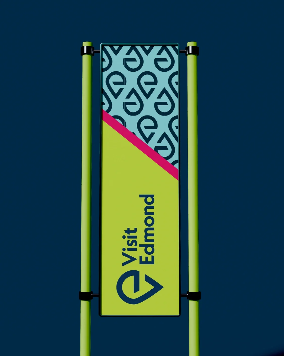 A rectangular sign with the words "Visit Edmond" and a location pin icon, supported by two yellow poles on a blue background.