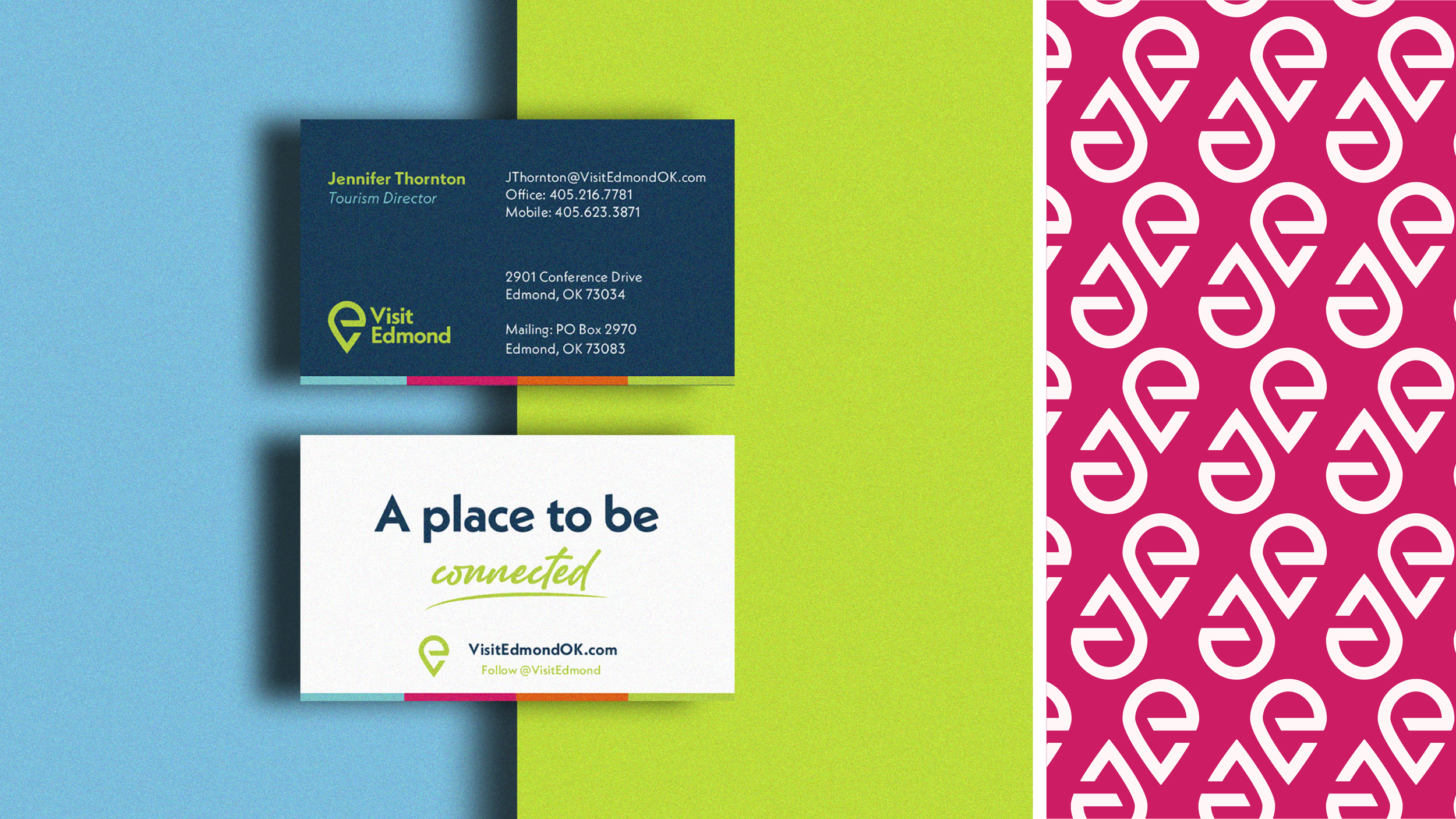 Business cards and marketing materials for Visit Edmond on a colorful background with blue, green, and pink patterns.