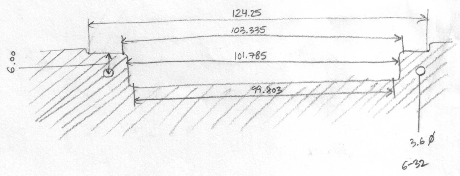 A technical drawing of a rectangular object with detailed measurements, showing its length, width, hole diameter, and depth, with annotated dimensions and a cross-section view.