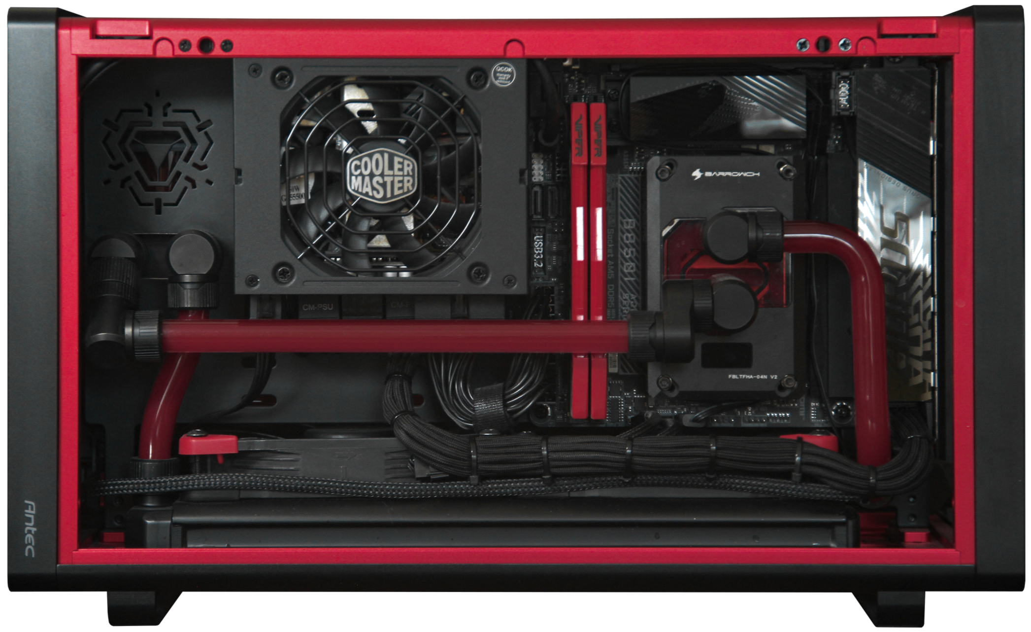 Inside a custom computer case showing a water cooling system with red tubes, a CPU water block, cooling fan, motherboards, memory sticks, and power supply.