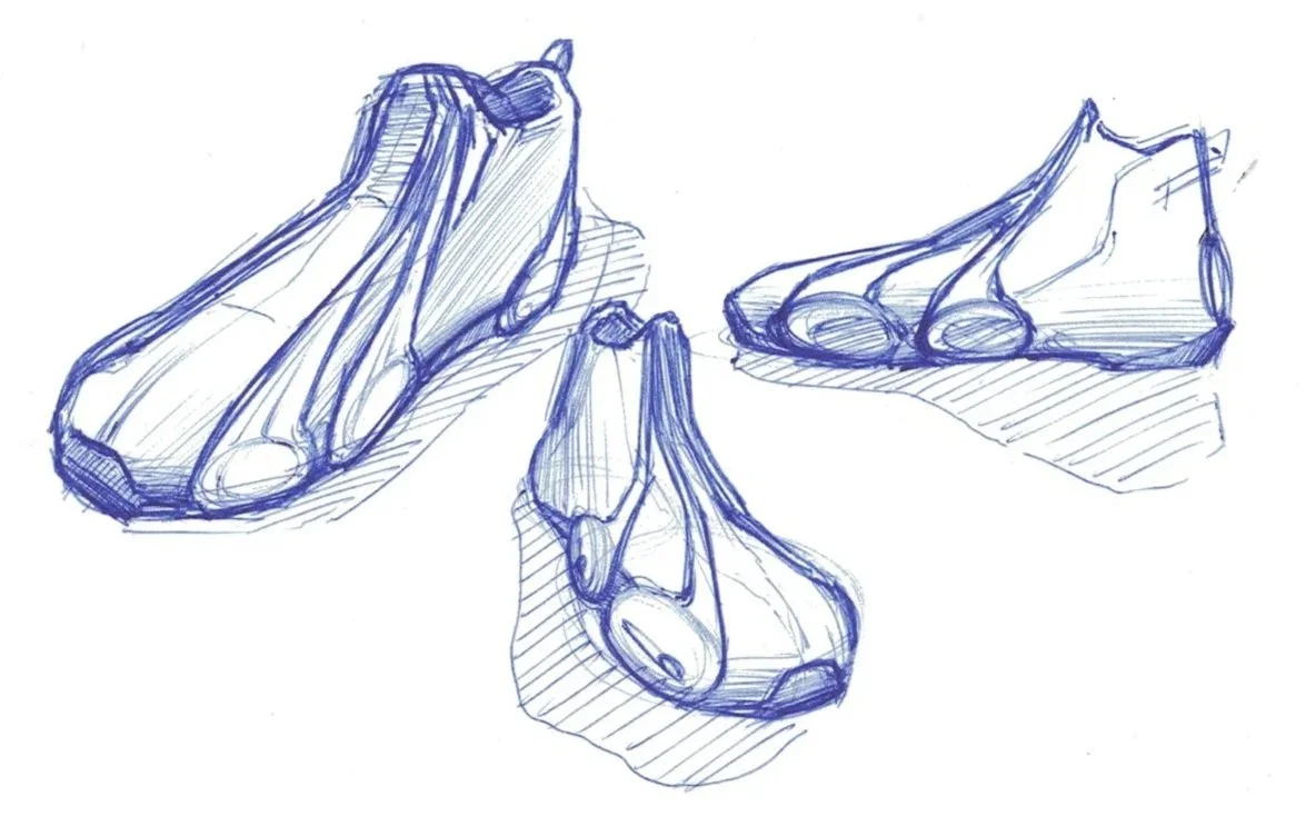 Sketch of three different shoe soles, drawn in blue ink on white paper.