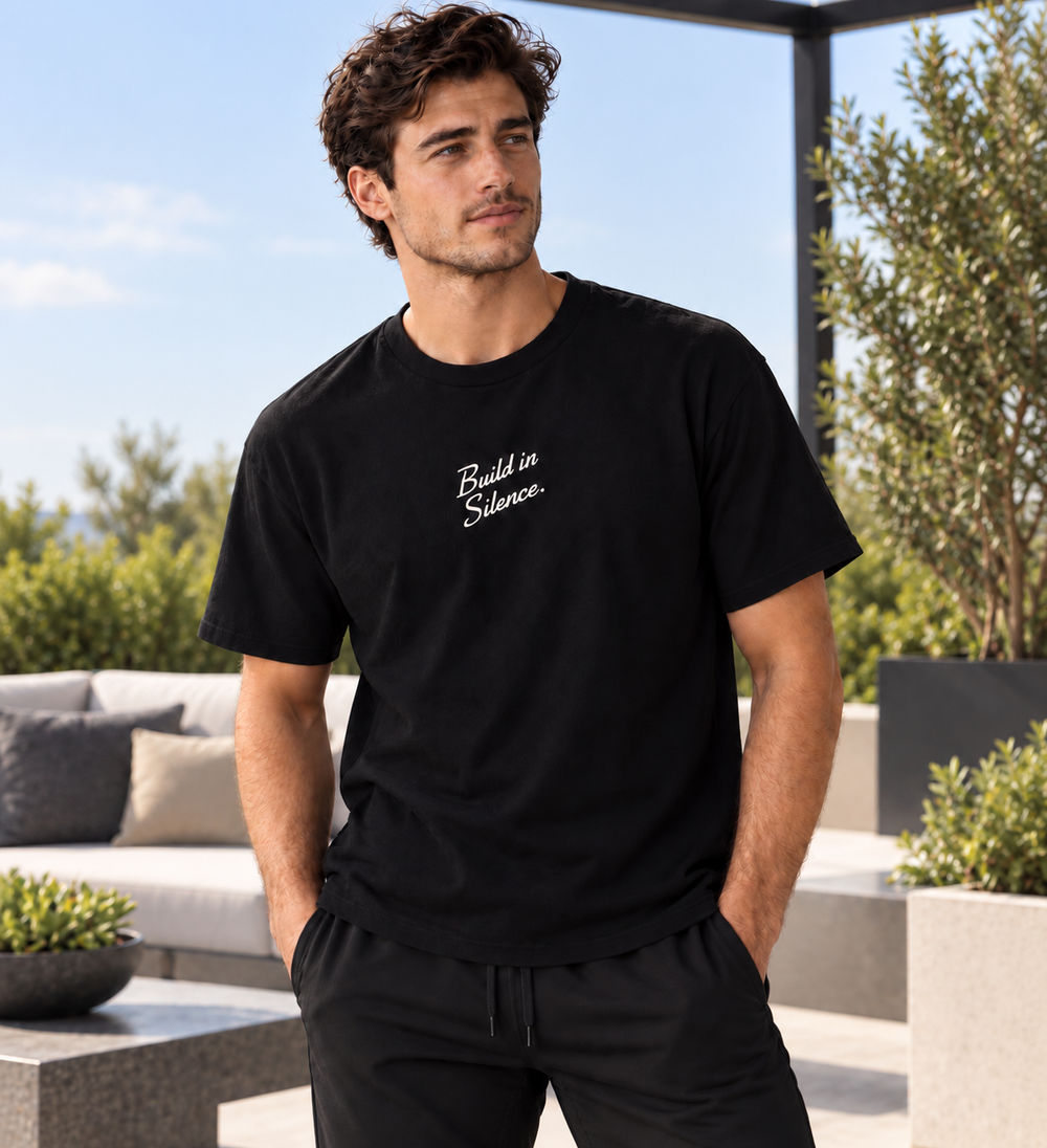 Build in Silence Foundation Tee in black with cream embroidery