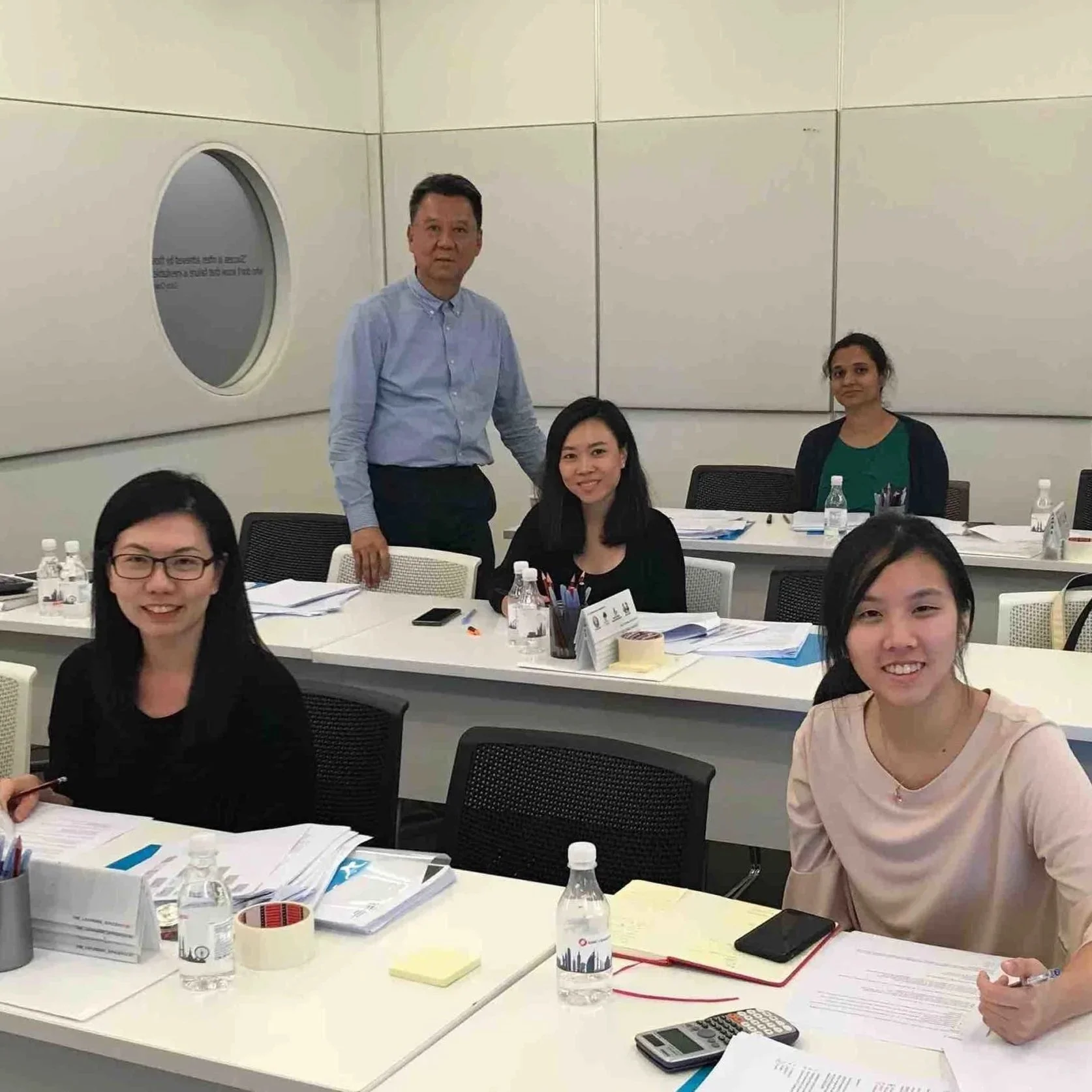 Khinloke conducting CMFAS training for financial professionals