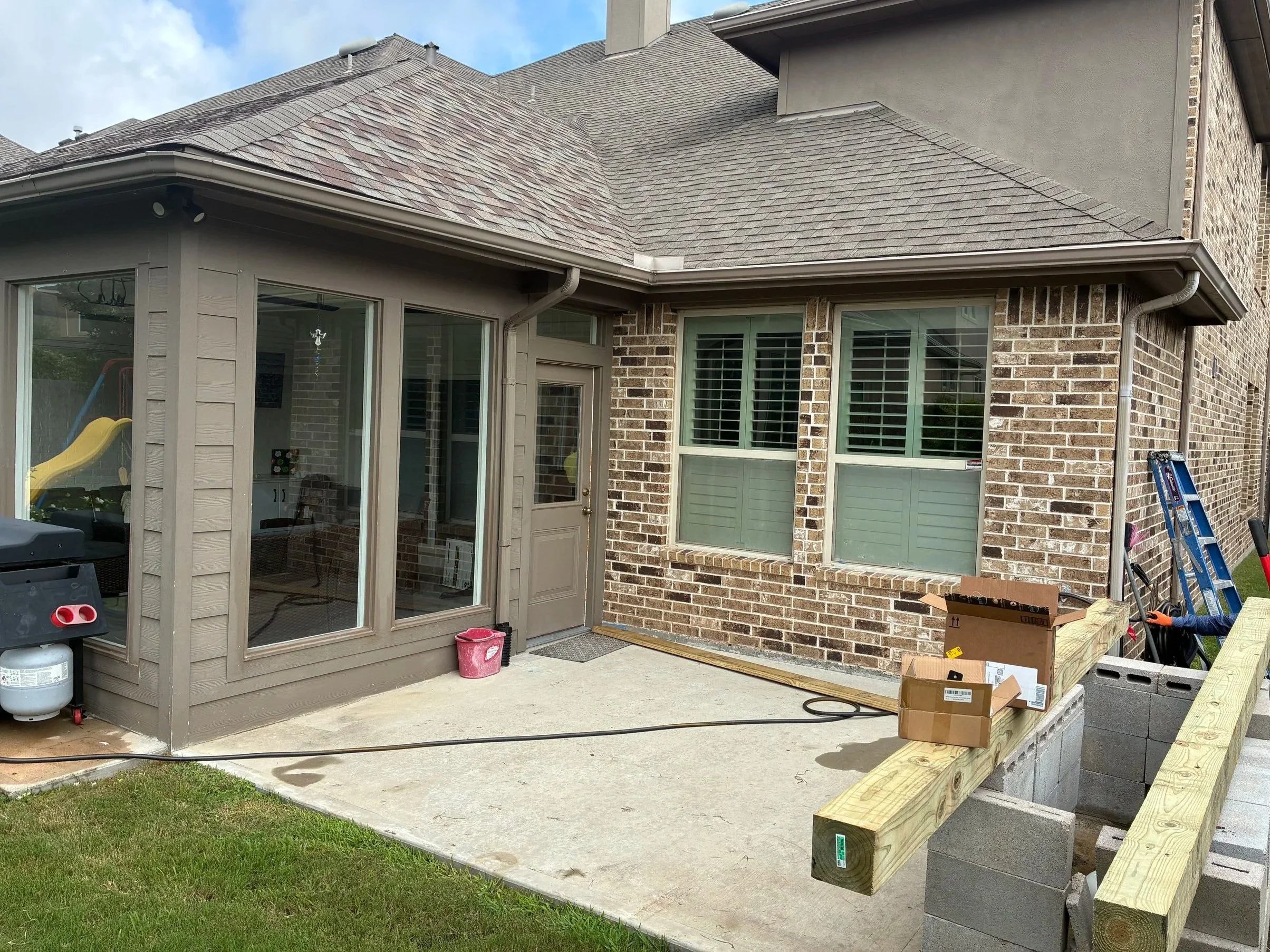 A simple backyard space that lacked purpose and visual appeal, ready for a thoughtful upgrade.