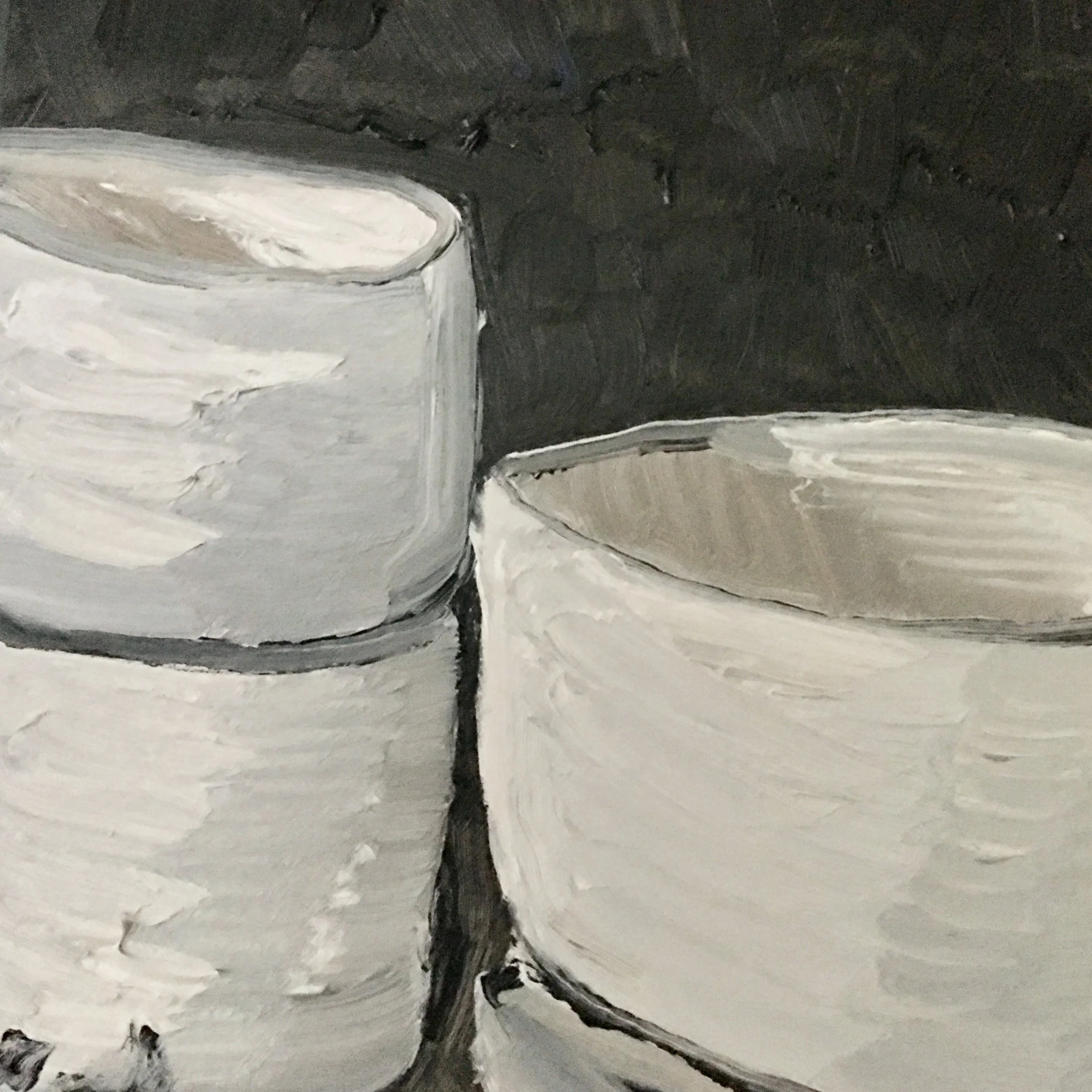 White dishes on a black background