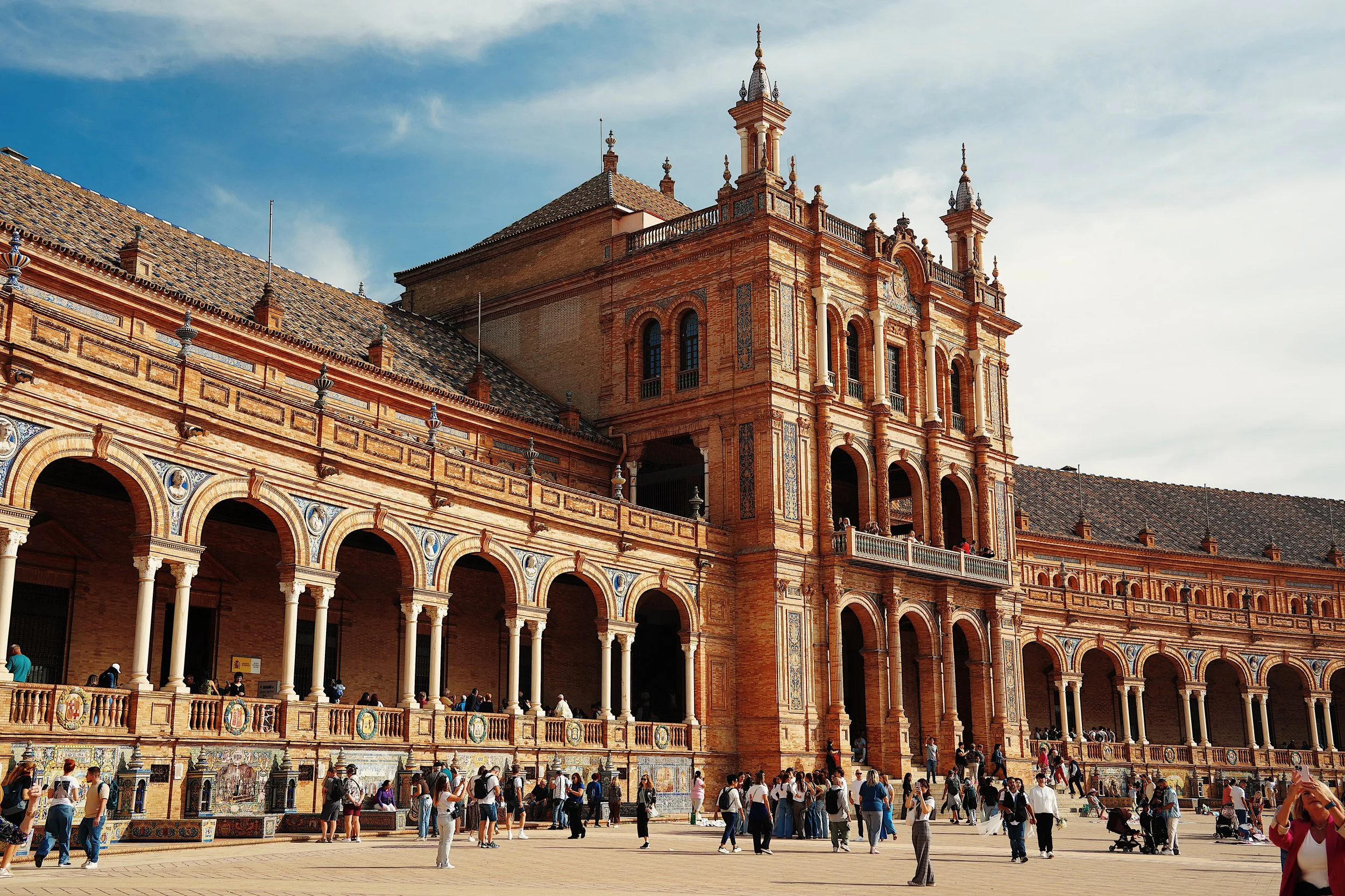 the famous plaza de españa, one of seville's must-see places that is free and should be on everyone's travel itinerary
