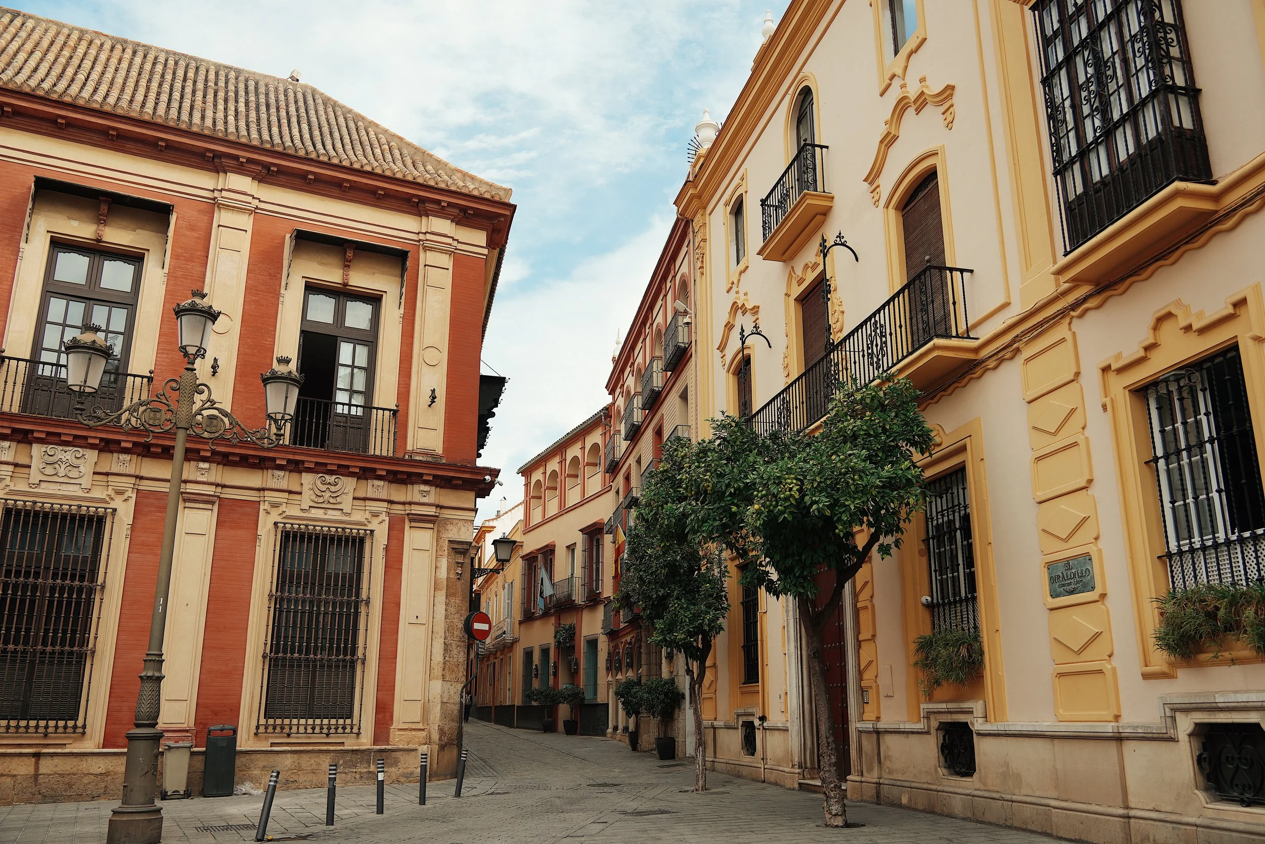 barrio santa cruz, one of sevilla's most charming neighborhoods that you don't want to miss on your trip to seville, spain