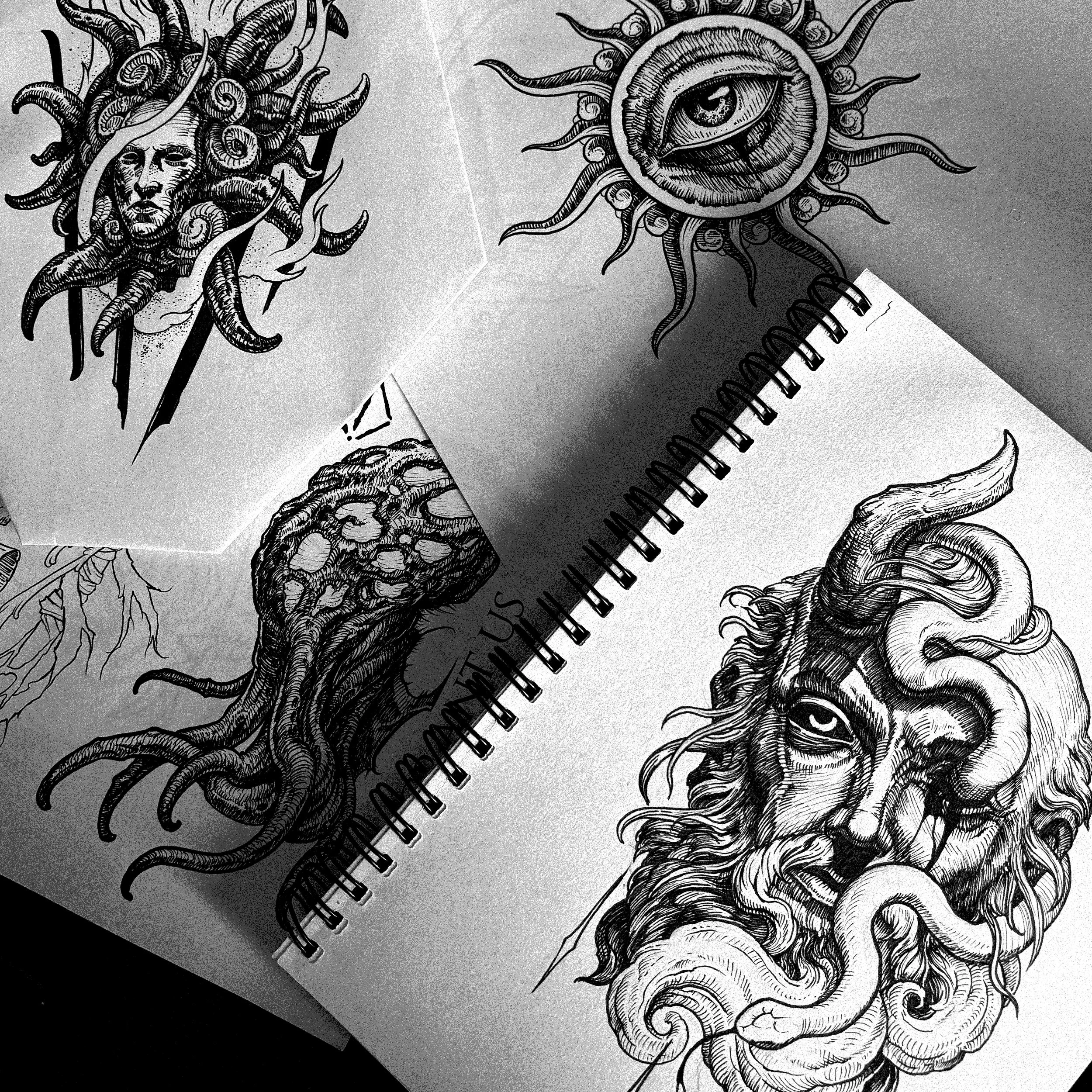 Black and white tattoo-style sketches of mythological and fantasy figures, including a face with tentacles like Medusa, a sun with an eye in the center, a tree with roots and a brain-like top, and a bearded man with horns and a serpent.
