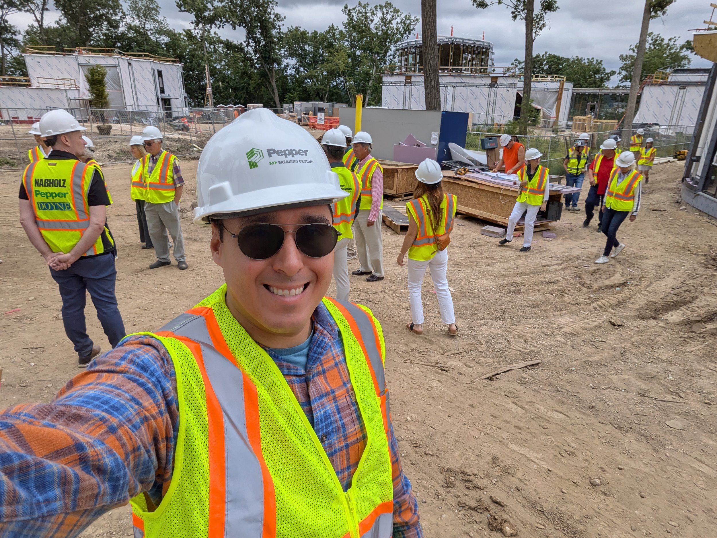 Adam participating in a hard-hat tour of Williams Bay's new Women's Leadership Center