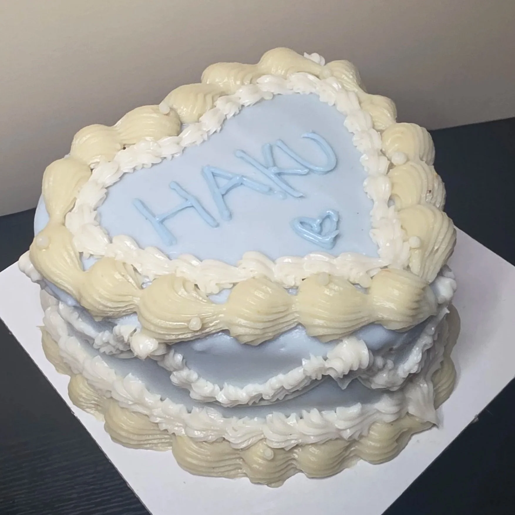 Lettering · Vintage 
6 inch · Heart  ·Baby Blue Base, Ivory Shells & White Details

Peanut Butter Carrot Cake: $45
Gentle Tummy MooMoo Cake: $55