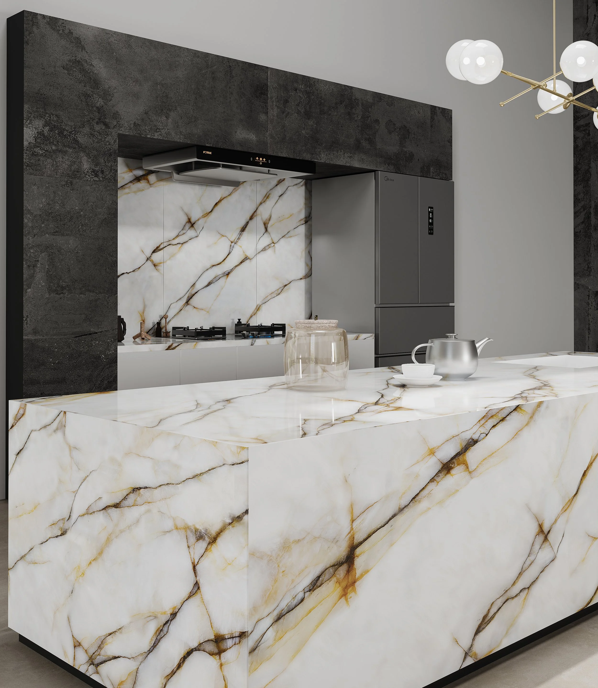Modern kitchen featuring a white marble island with gold and brown veining, a gray refrigerator, a black countertop stove, and a marble backsplash, with dark wall accents and a contemporary light fixture.