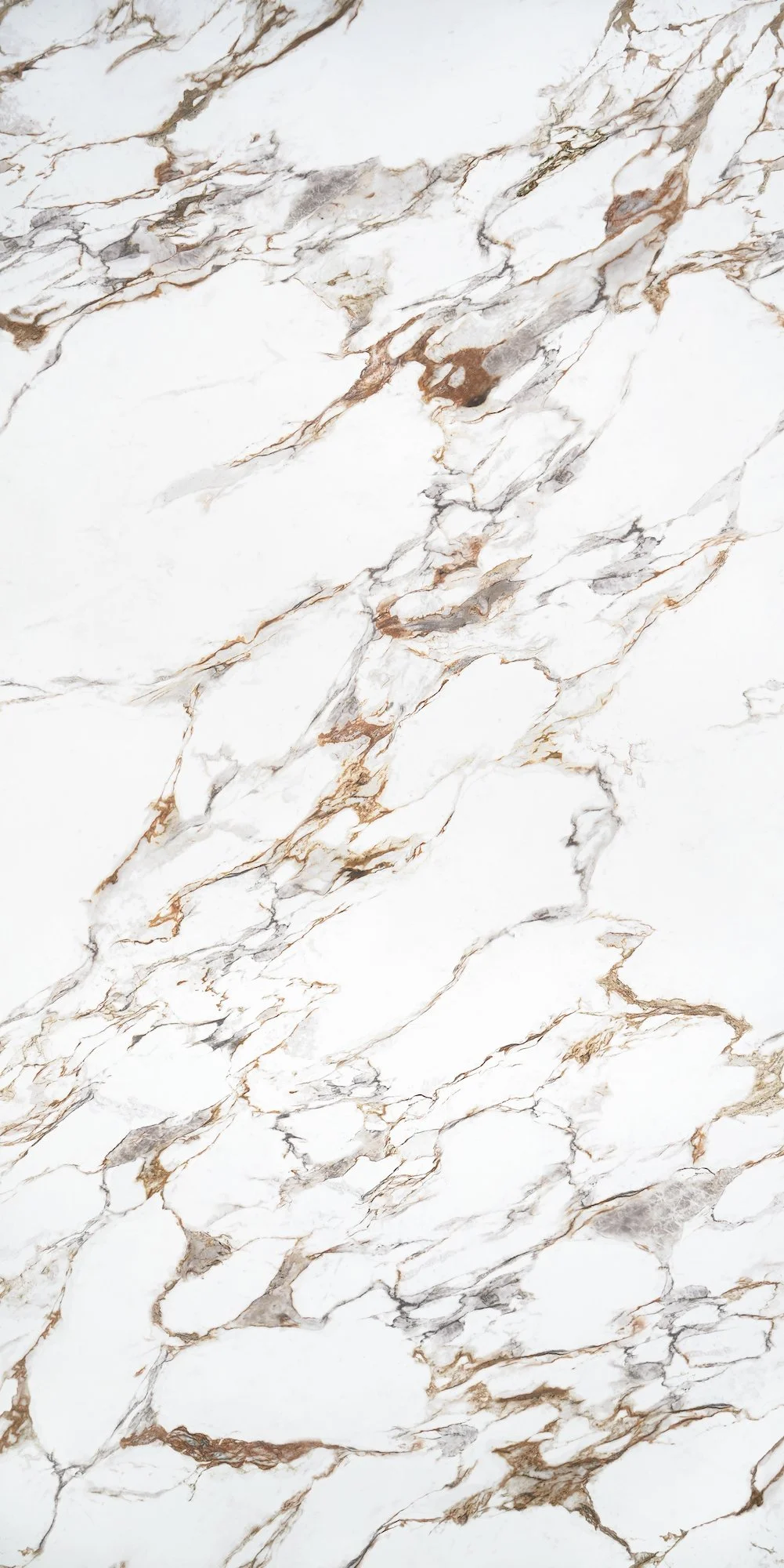 White marble surface with gray and gold veining.