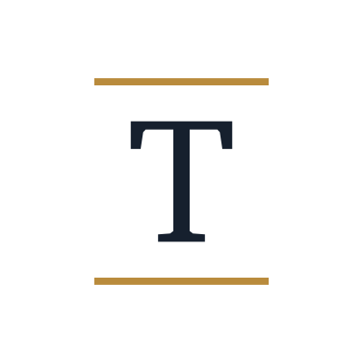 Centered capital letter 'T' with horizontal gold lines above and below
