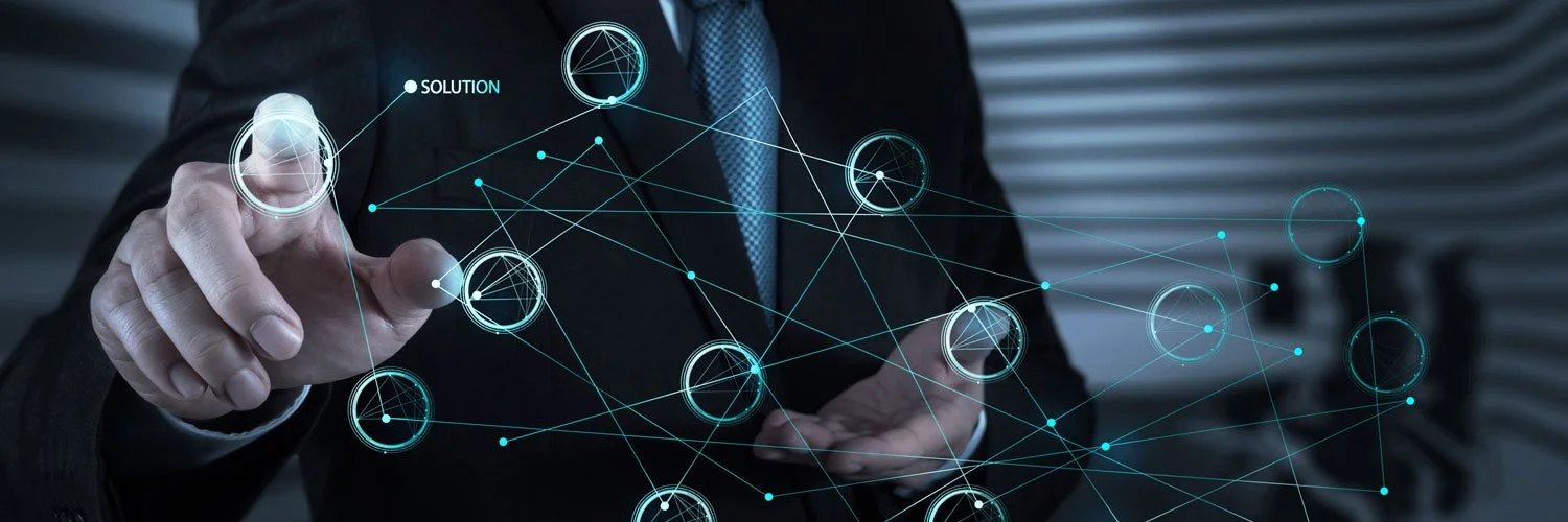 Businessman in a suit interacts with a digital network of interconnected nodes and circles, with the word 'Solution' visible, representing technology or data analysis.