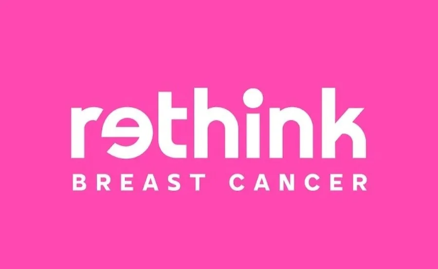 Pink background with white text: "rethink BREAST CANCER"