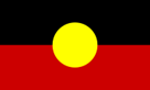 Flag with a black top half, a red bottom half, and a yellow circle in the center